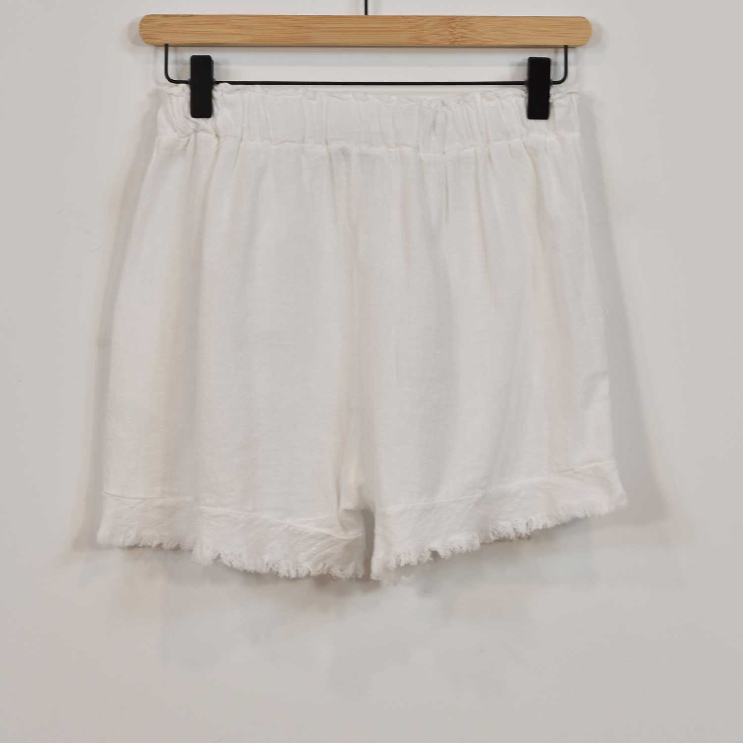 White frayed shorts
