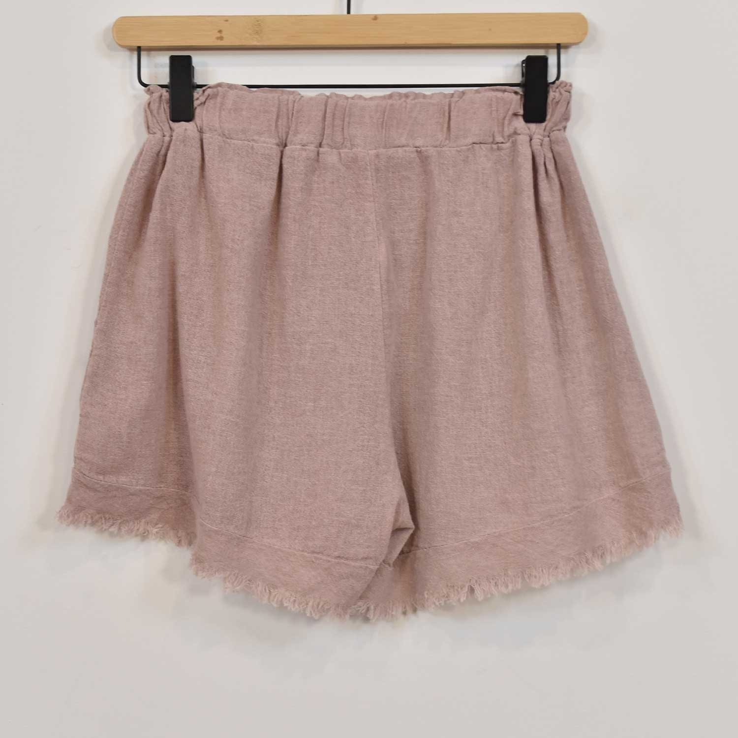 Pink frayed shorts