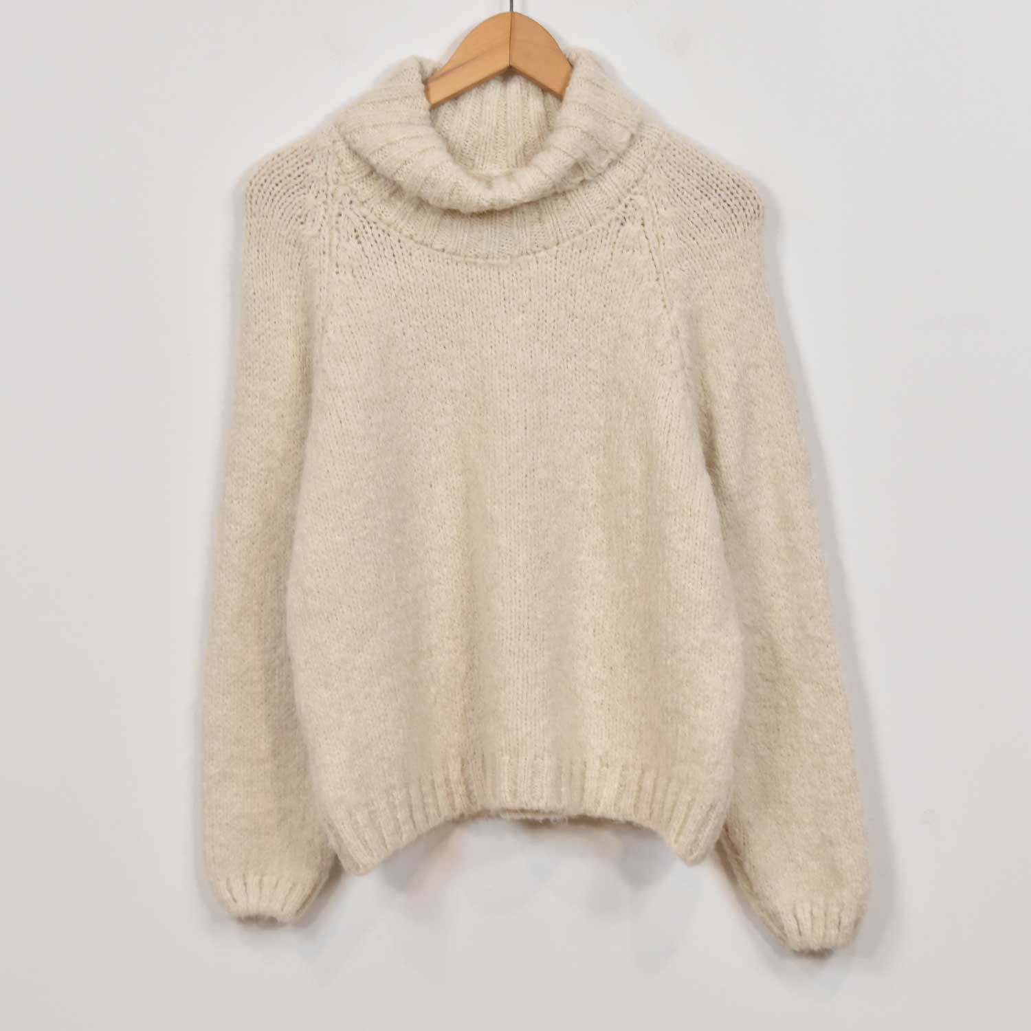 Beige turtleneck sweater