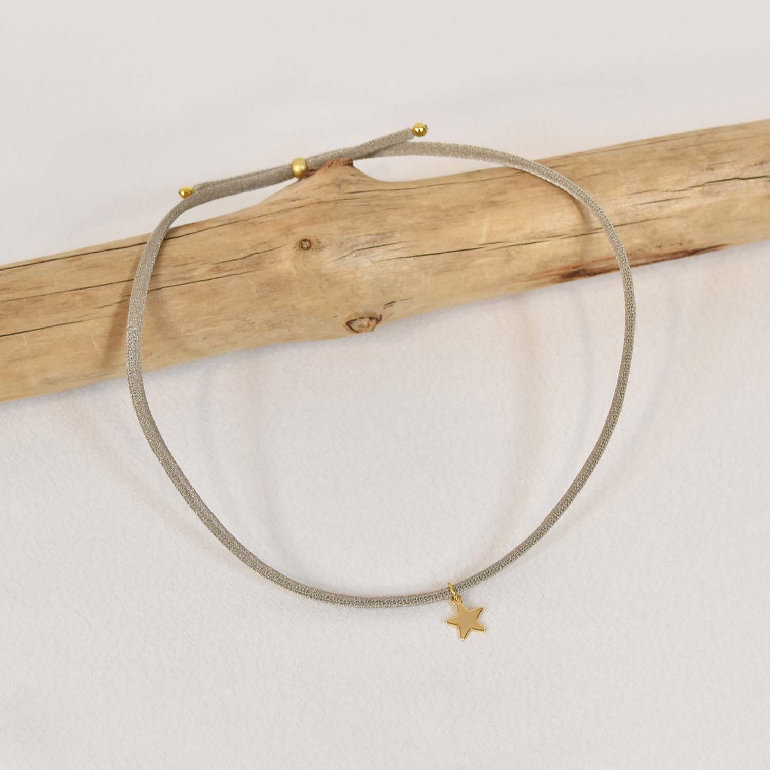 Taupe gold star elastic necklace