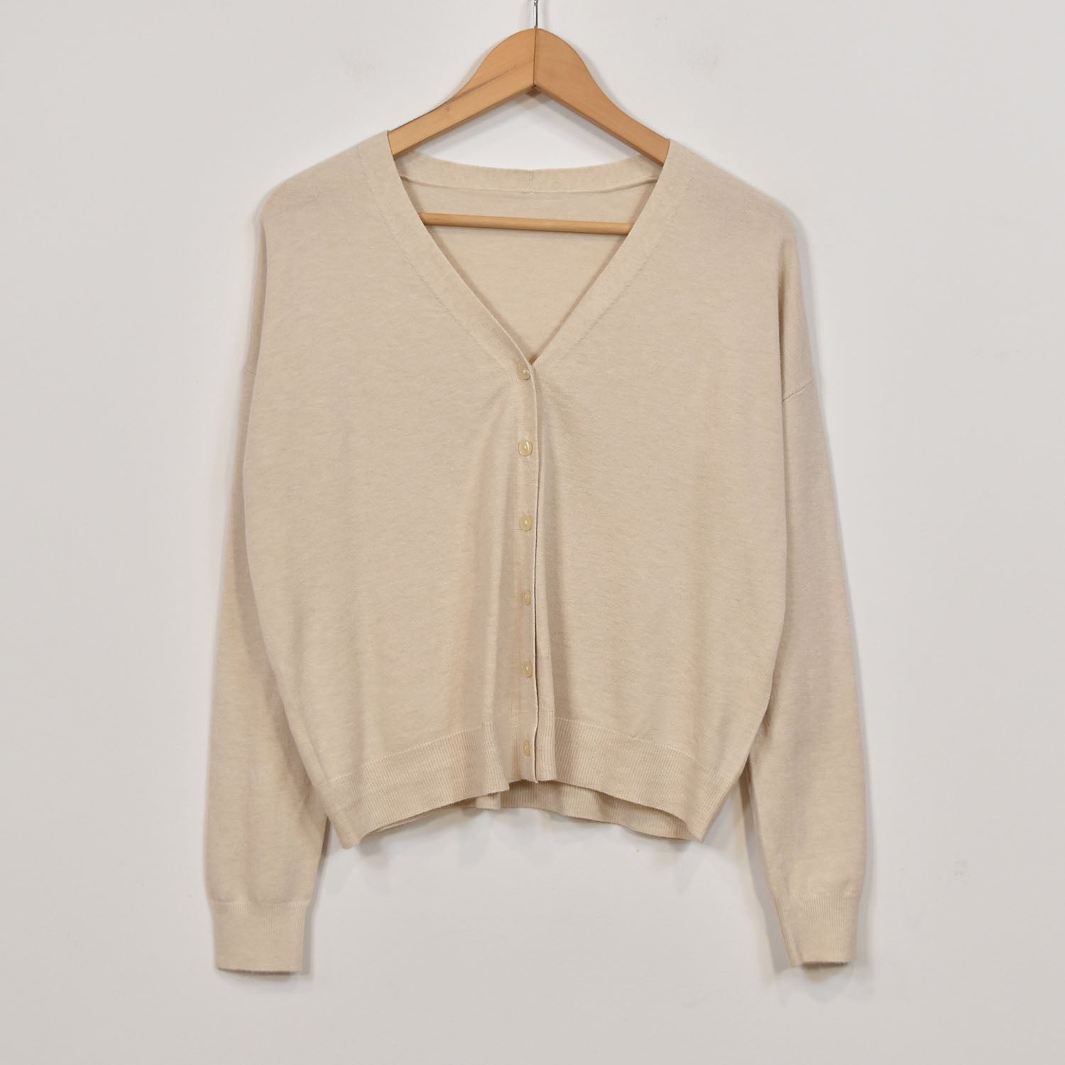 Veste beige a col V boutons 