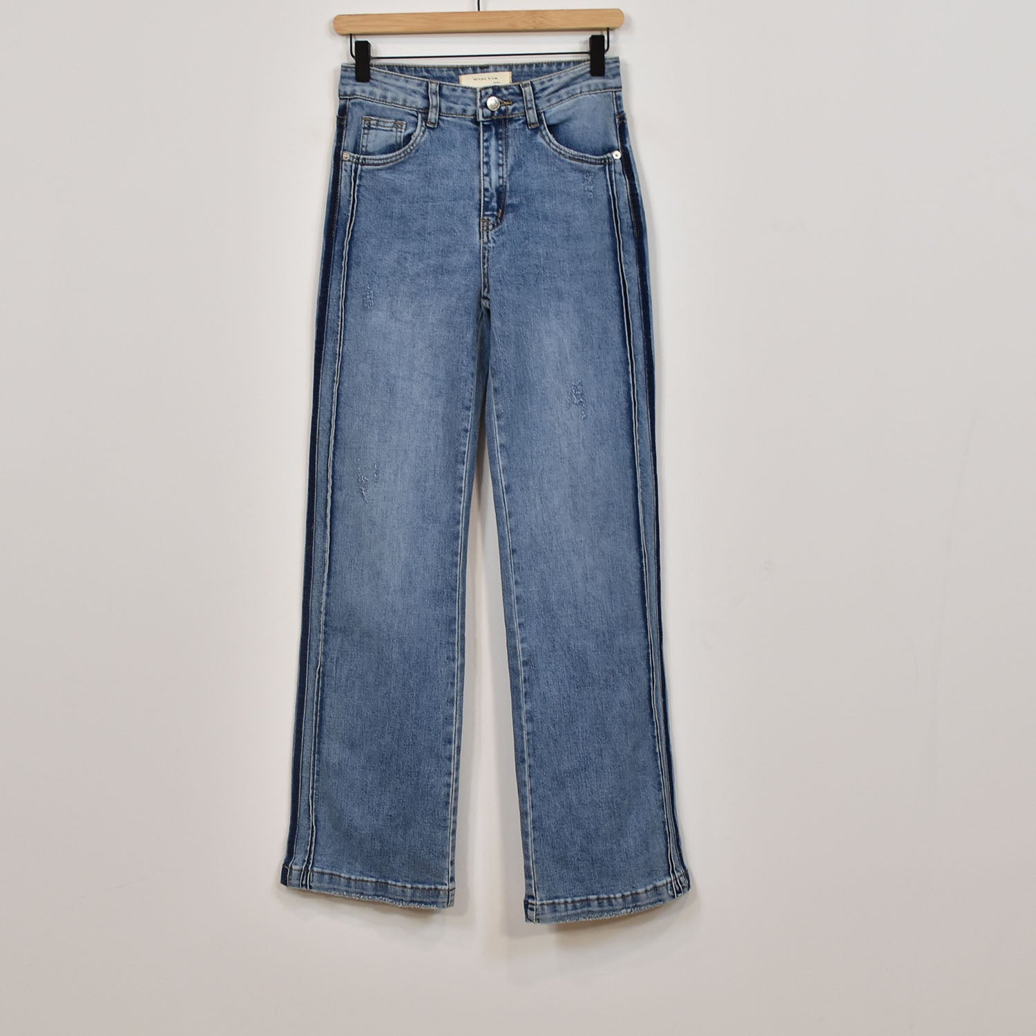 Wide leg jeans worn