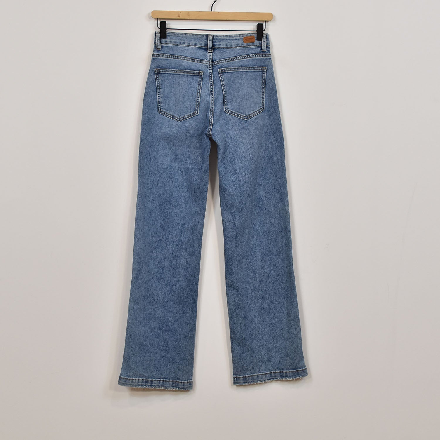 Wide leg jeans worn