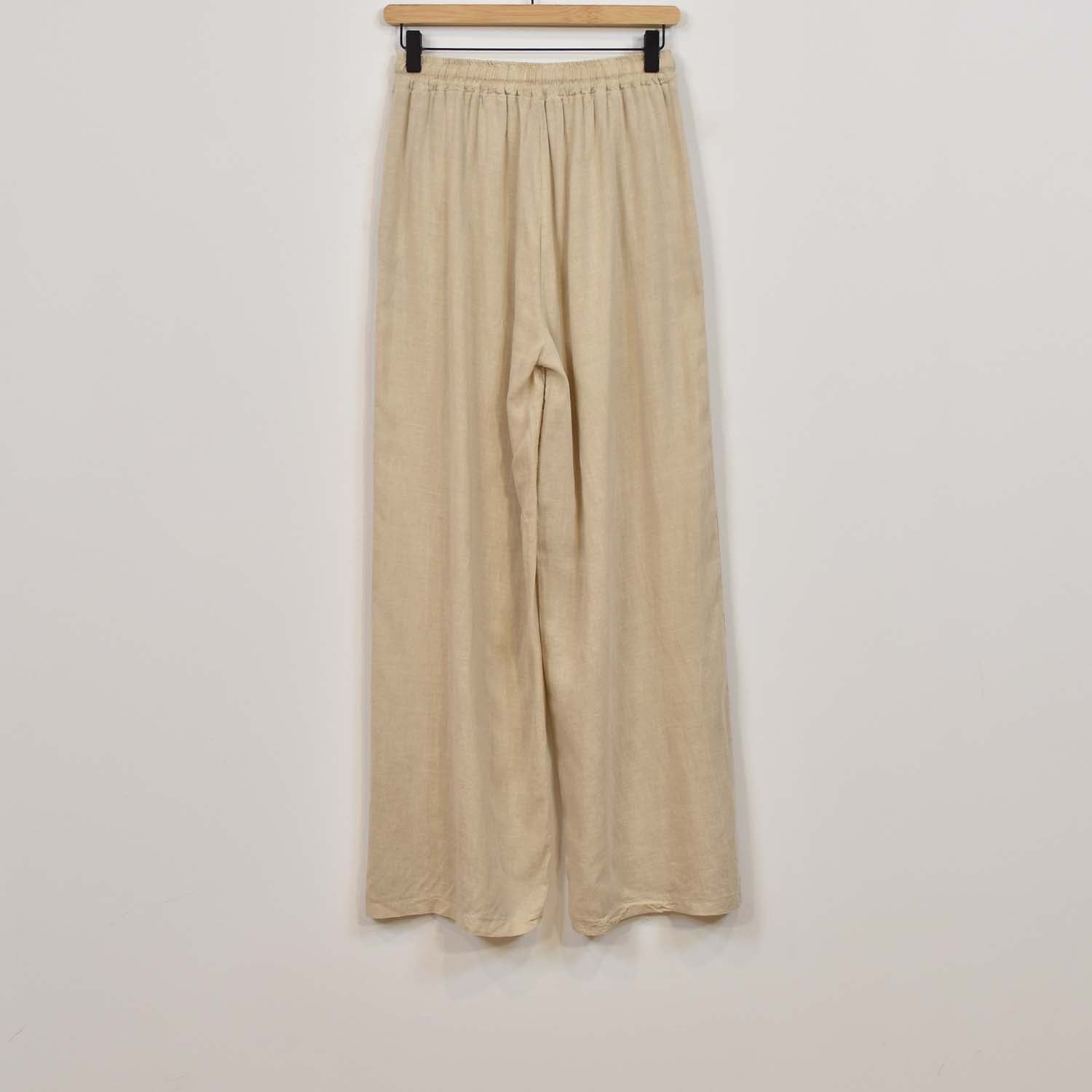 Pantalon large beige avec poches