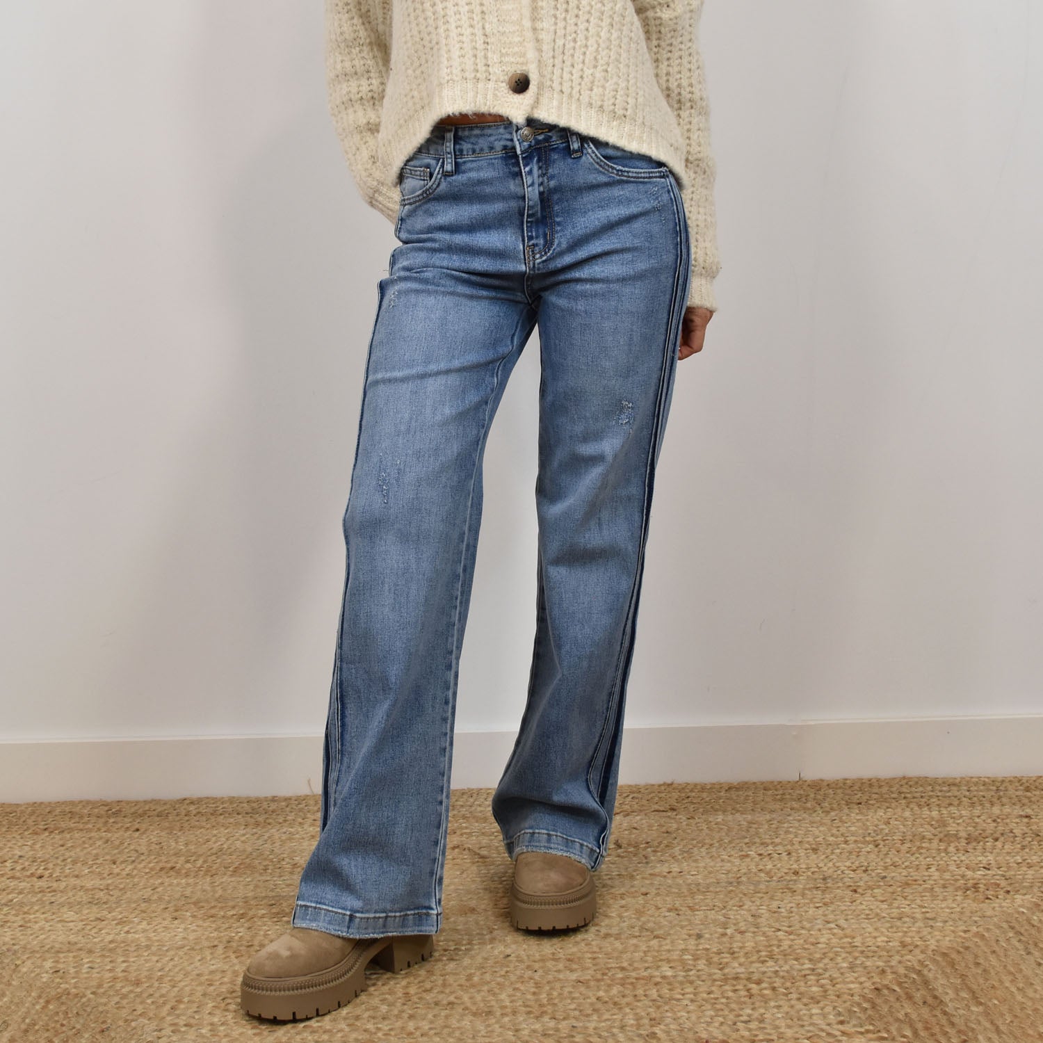 Wide leg jeans worn