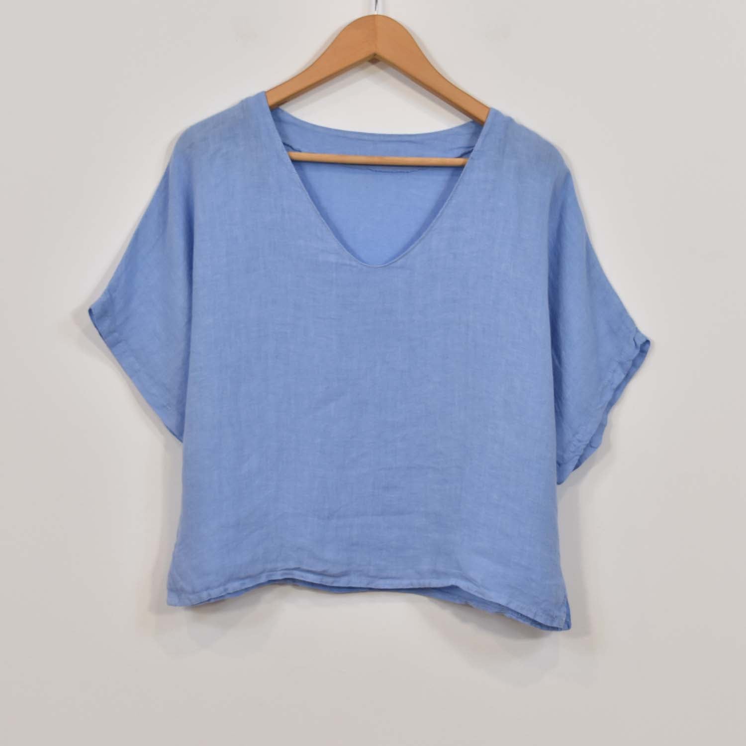 Blue V-neck linen blouse