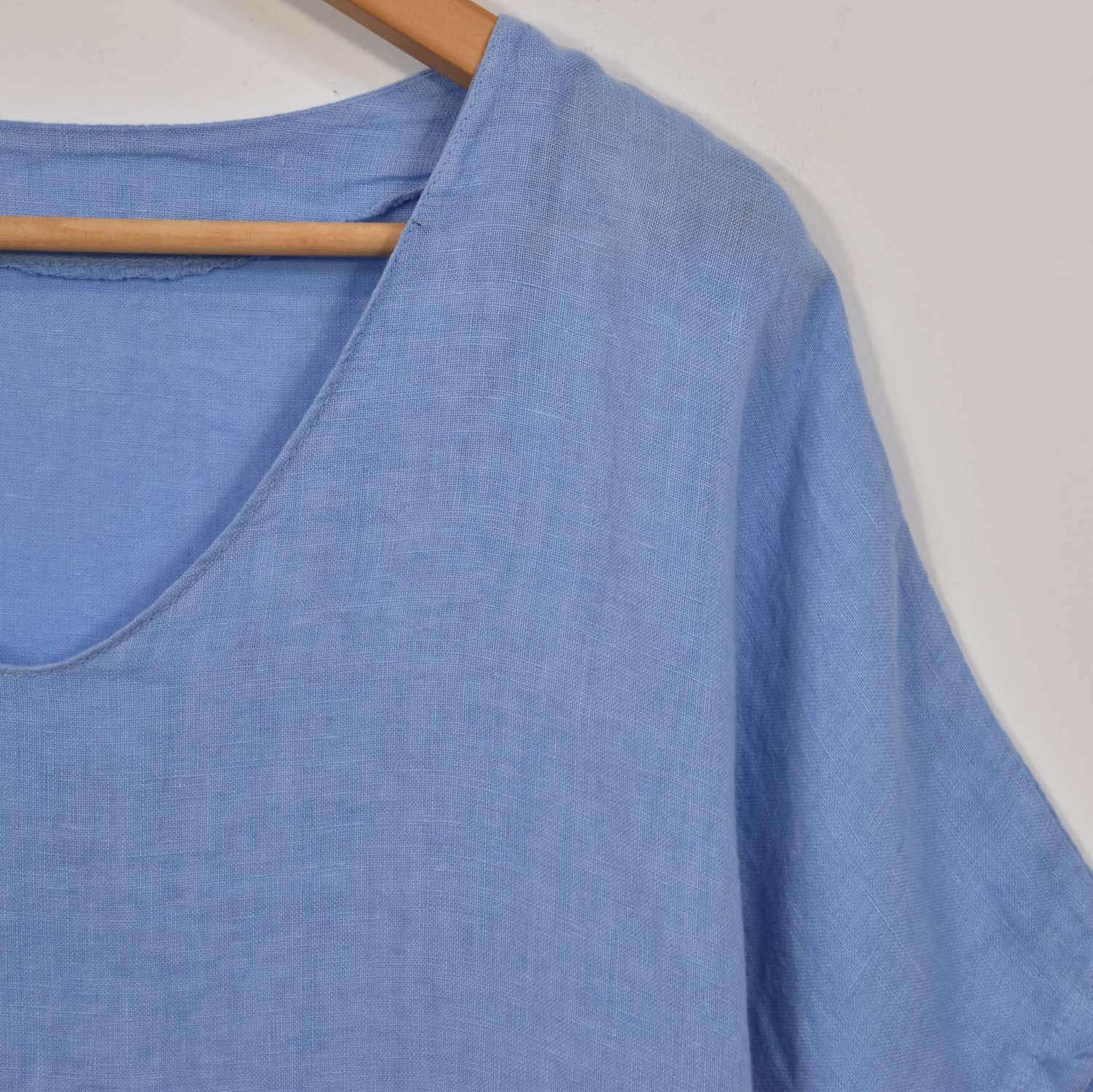 Blue V-neck linen blouse