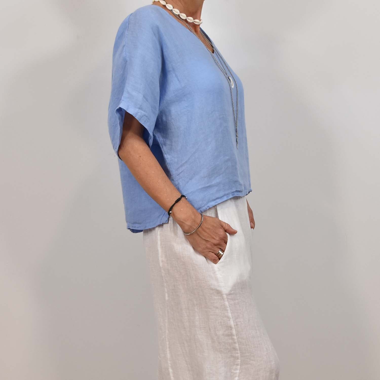 Blue V-neck linen blouse