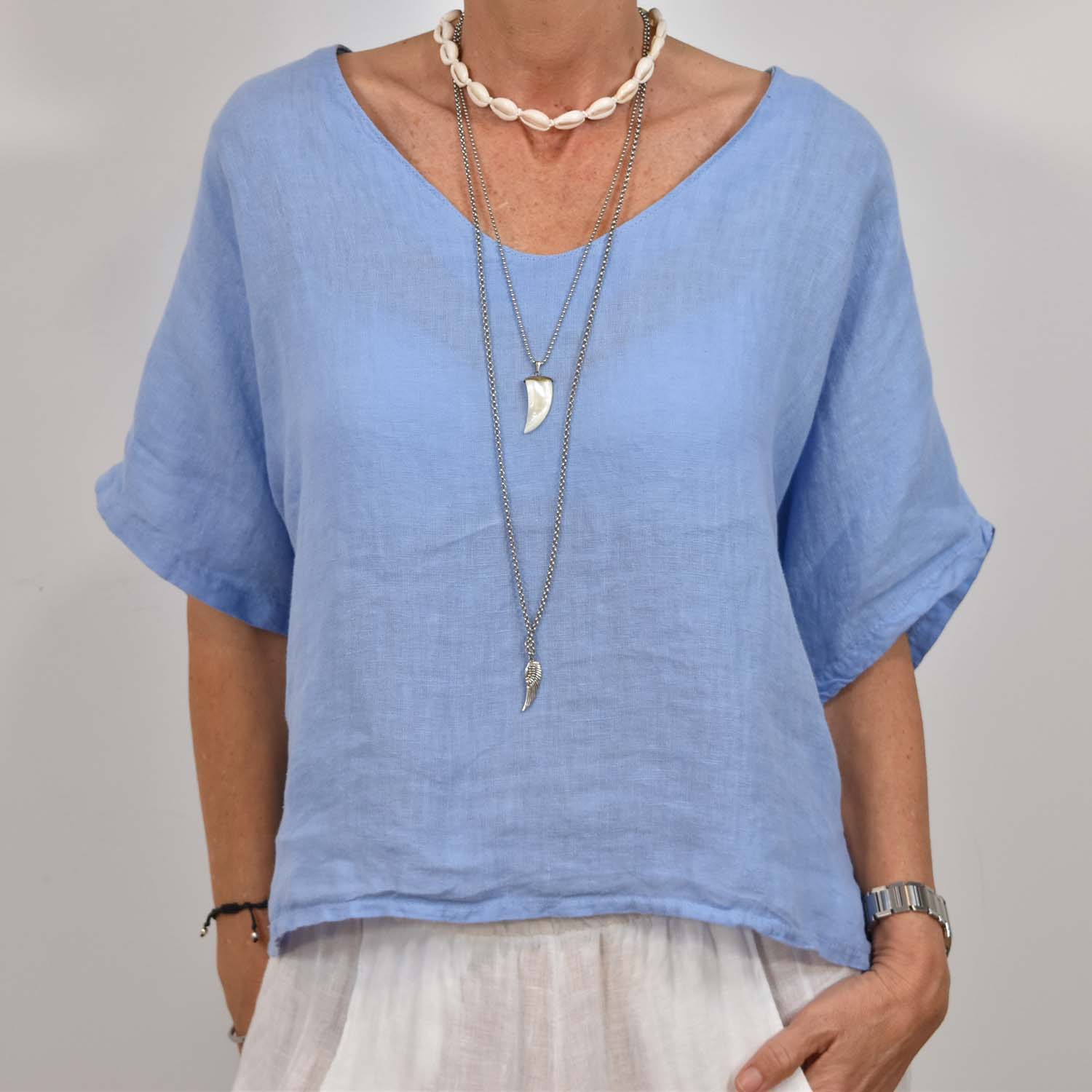 Blue V-neck linen blouse