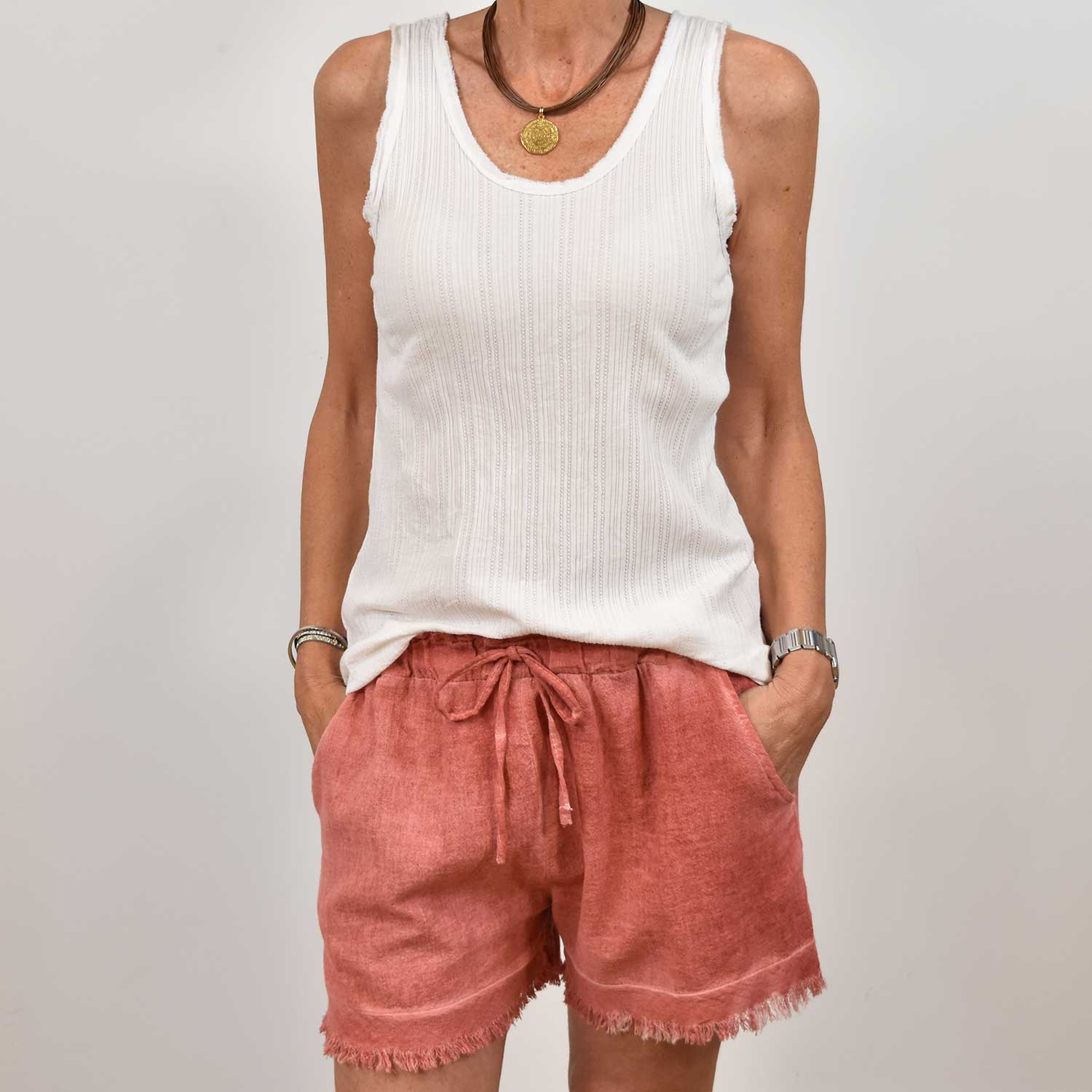 Red frayed shorts