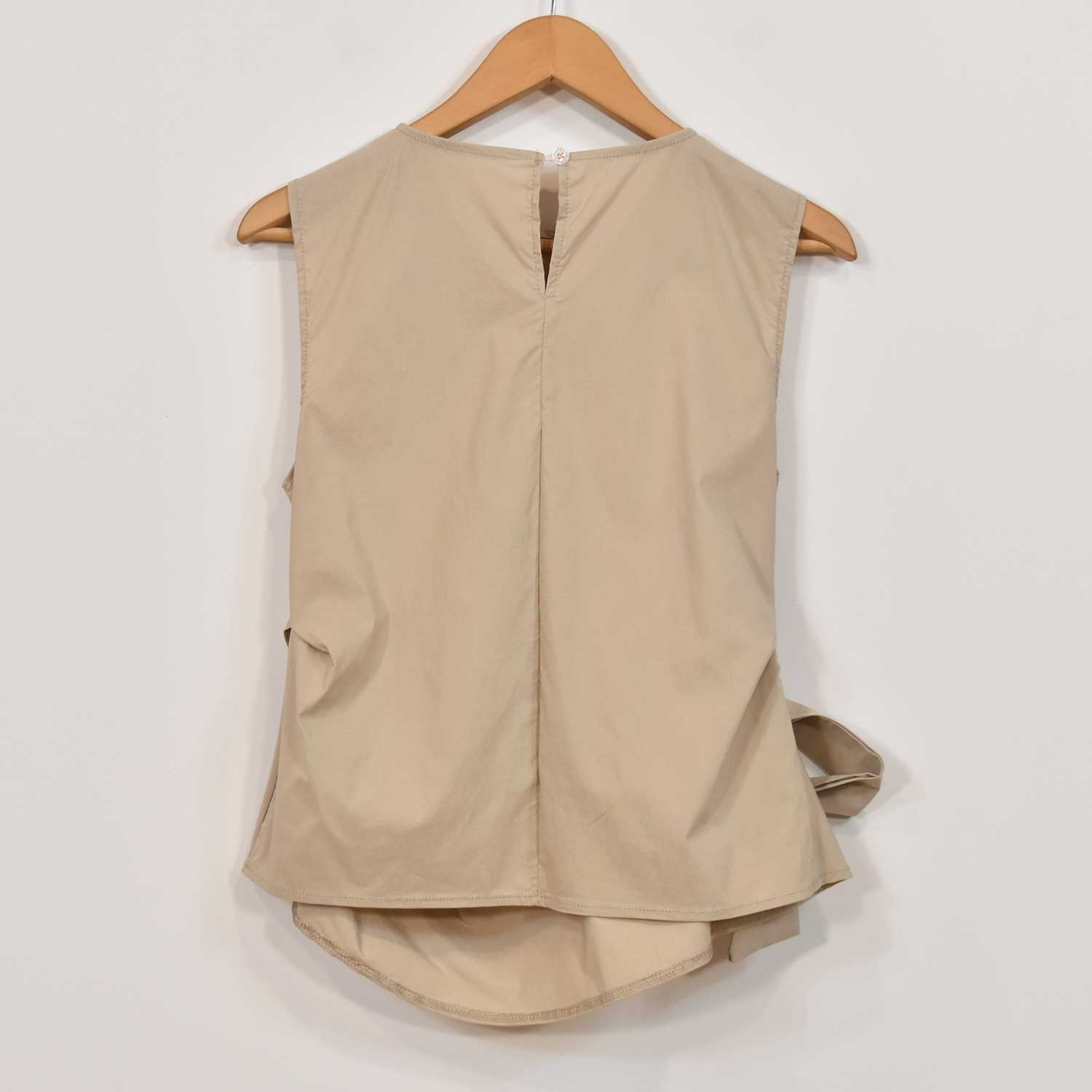 Blouse beige à nœuds
