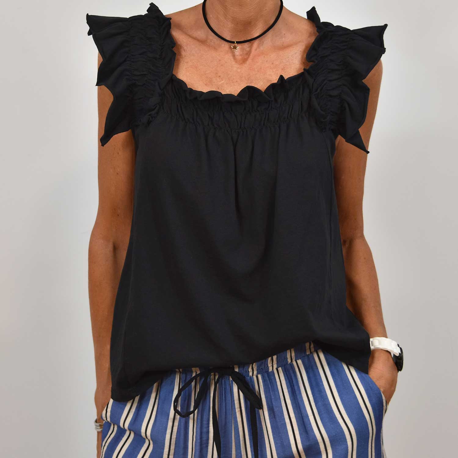 Black ruffled t-shirt