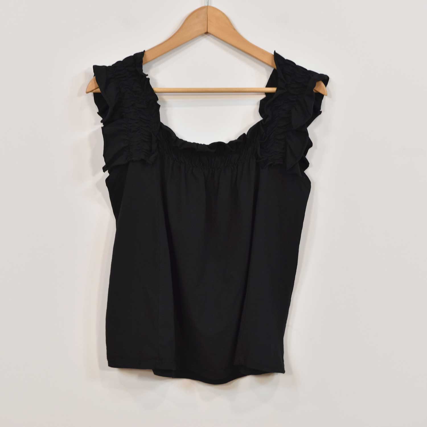 Black ruffled t-shirt