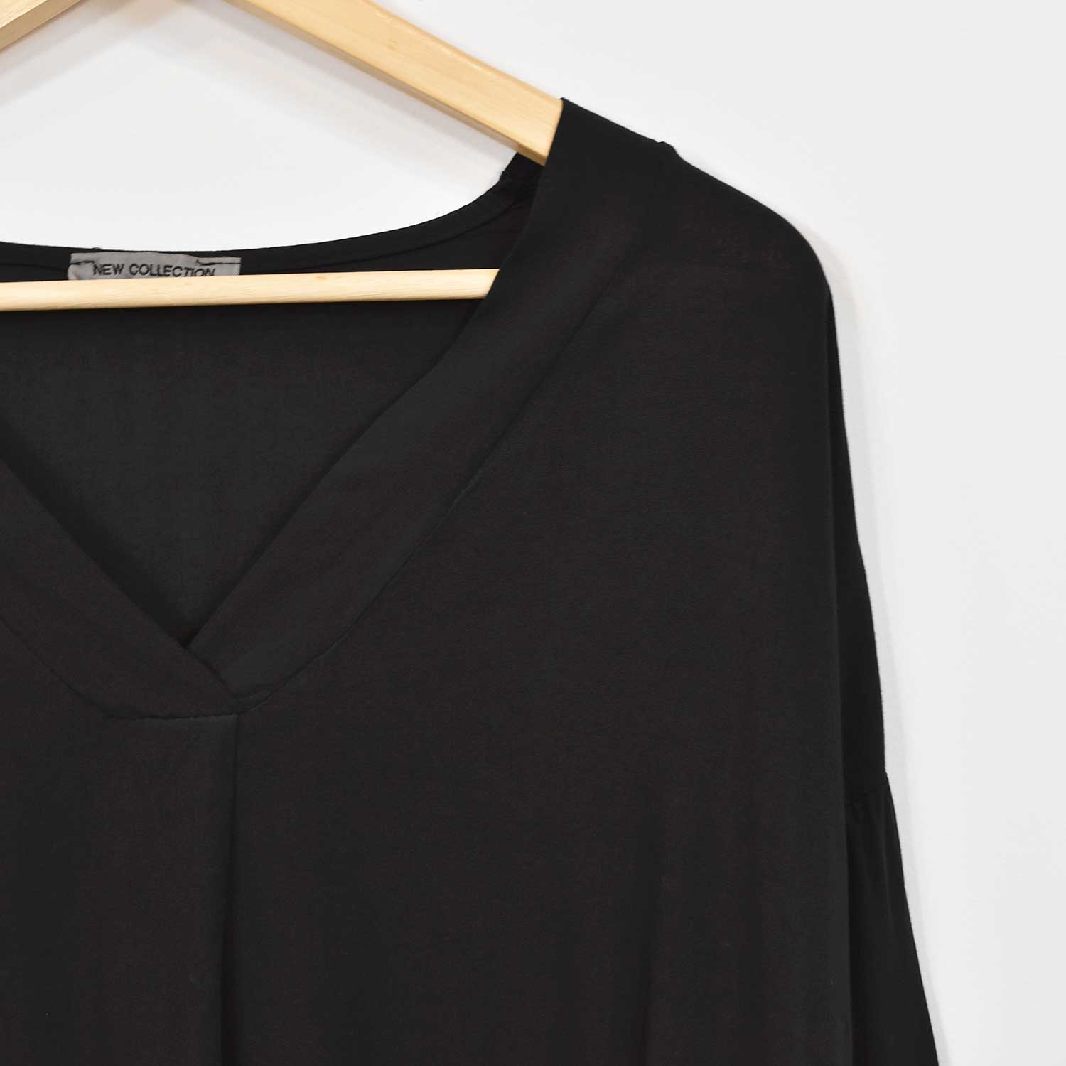 Blusa pico negra