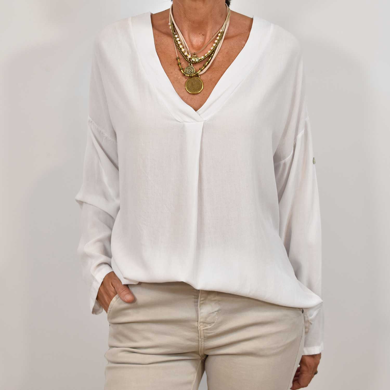 White oversize V-neck blouse