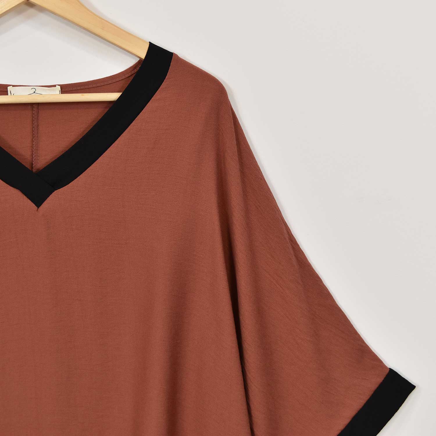 Blusa bicolor marsala