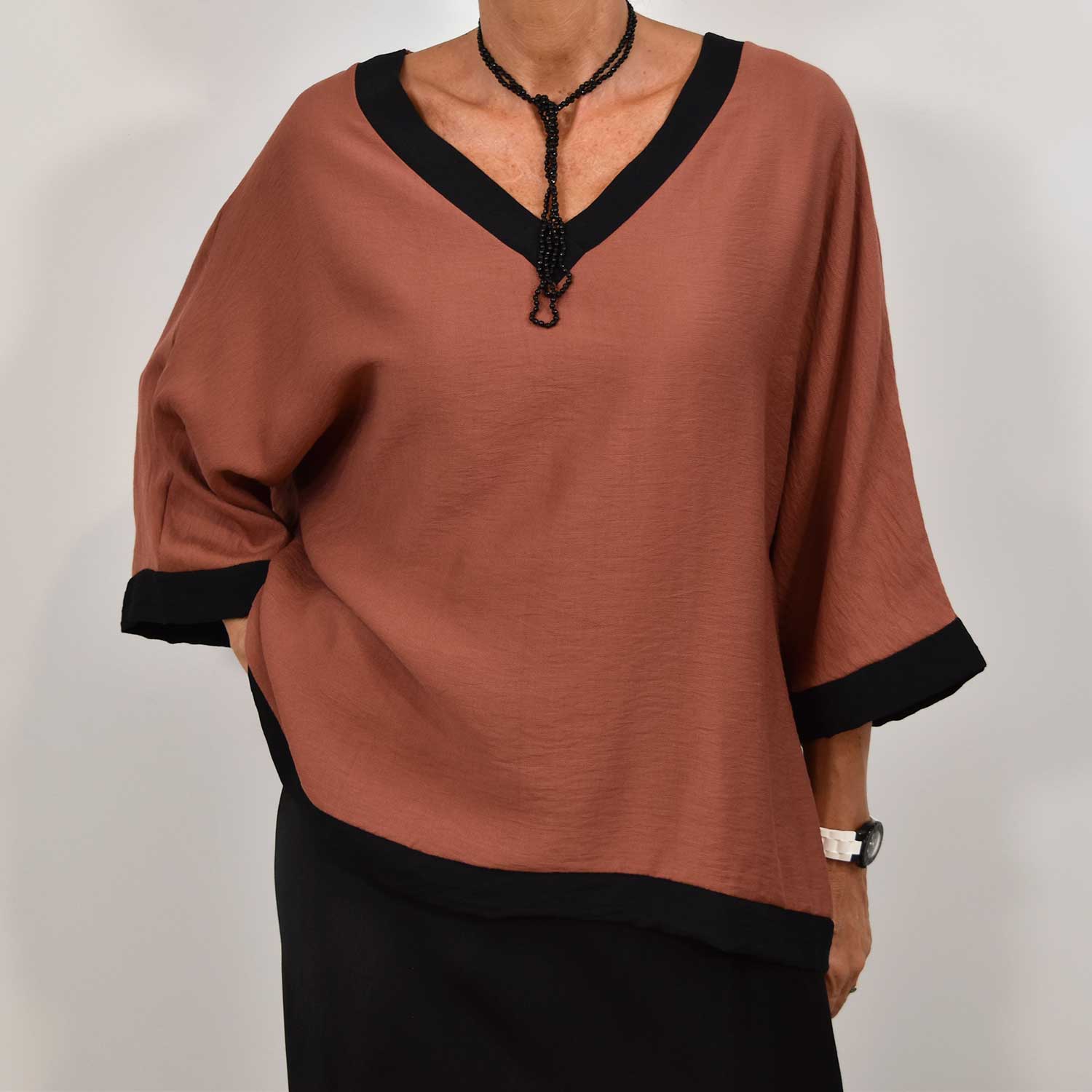 Blusa bicolor marsala