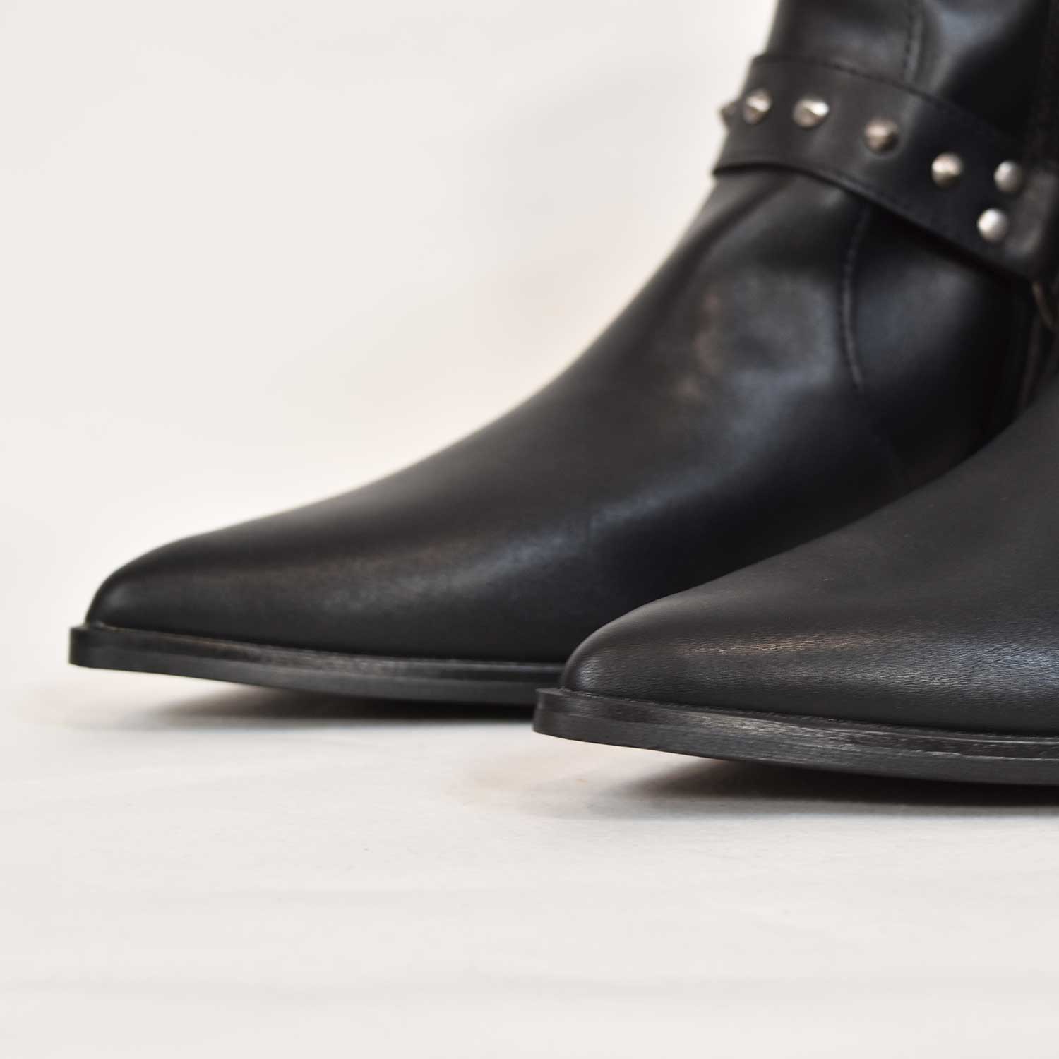 Black flat cowboy ankle boot