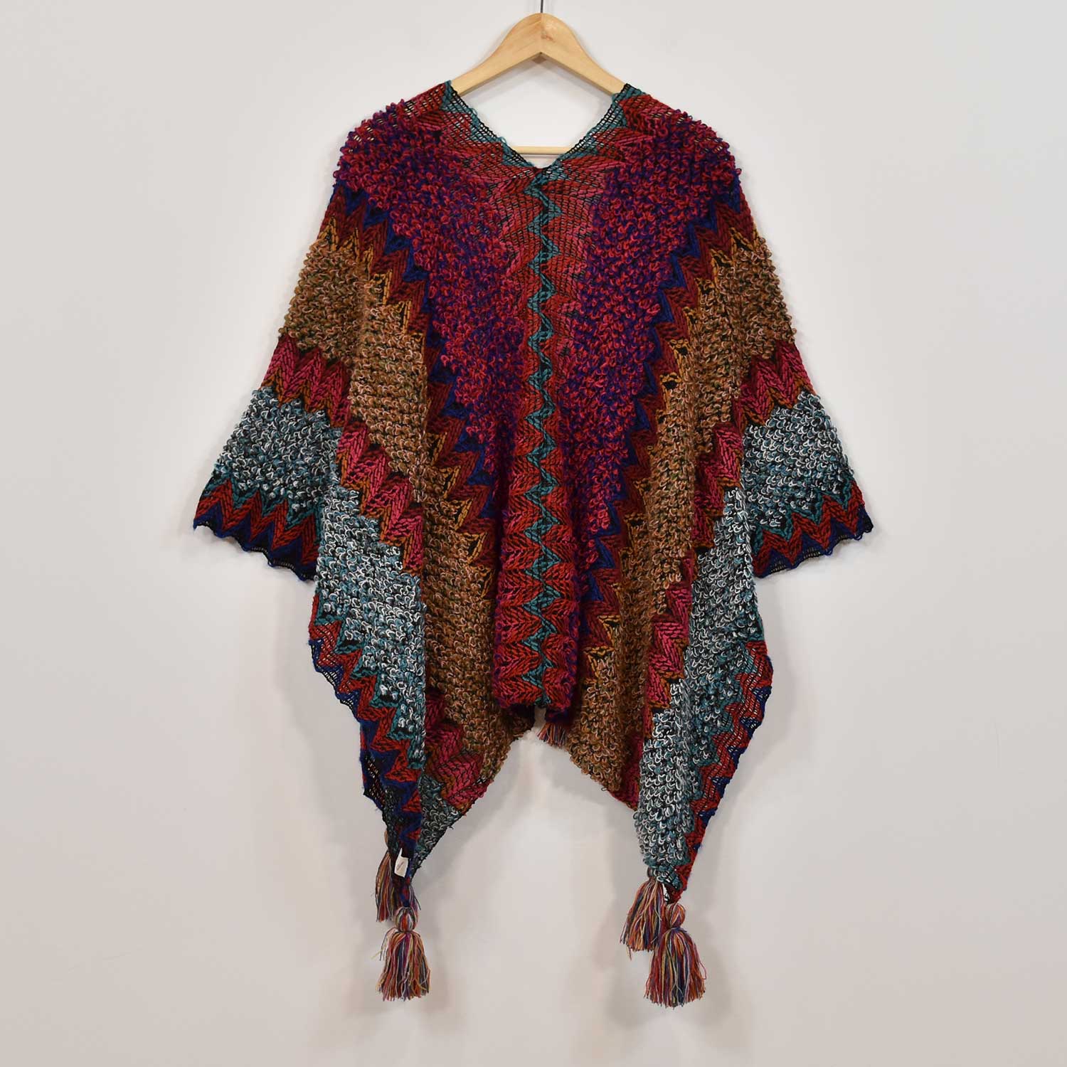 Pink fringed poncho