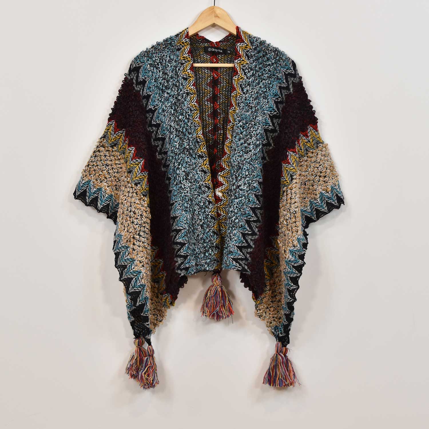 Poncho frangé bleu