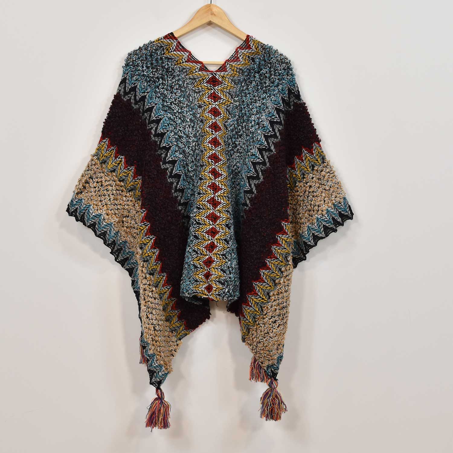 Poncho frangé bleu