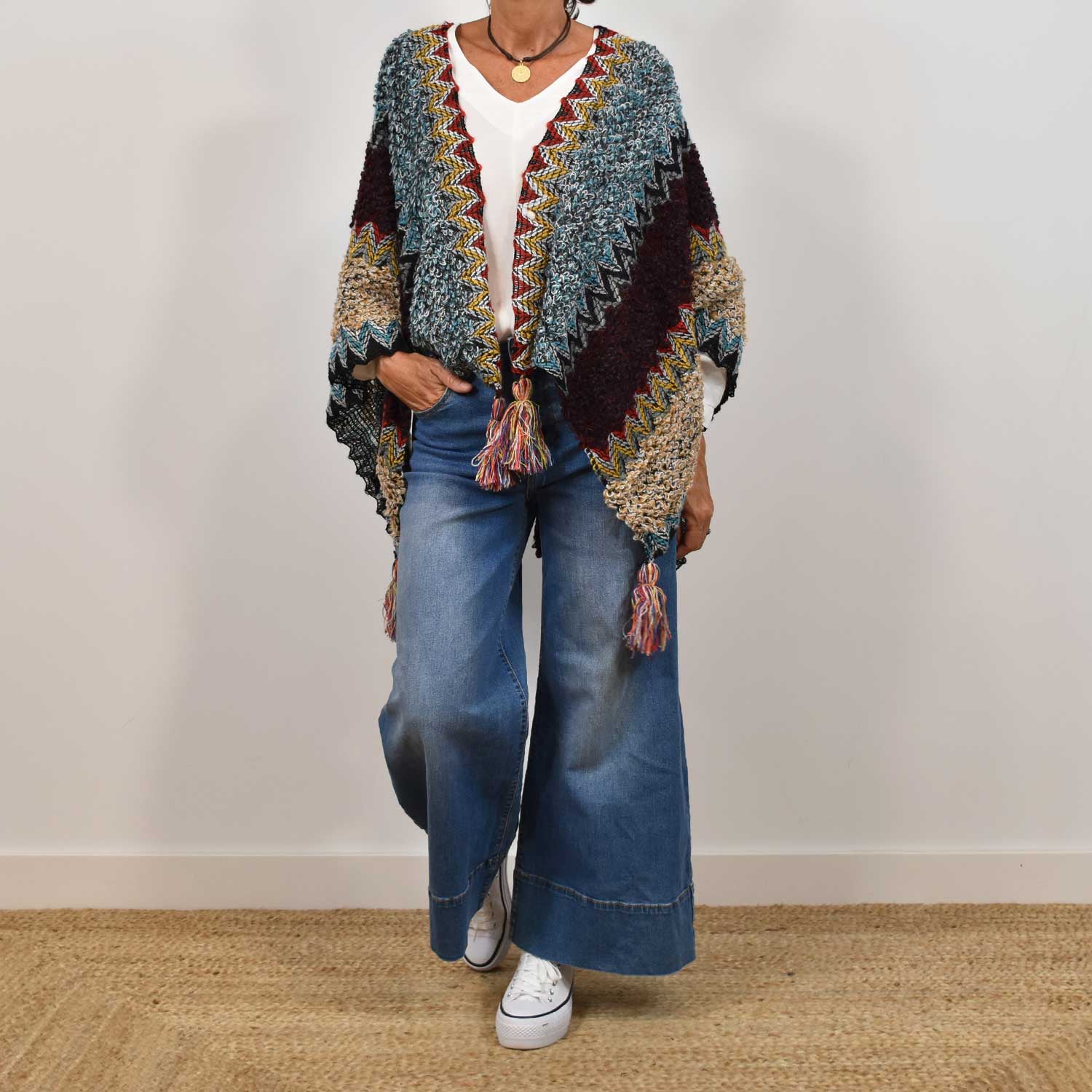 Blue fringed poncho