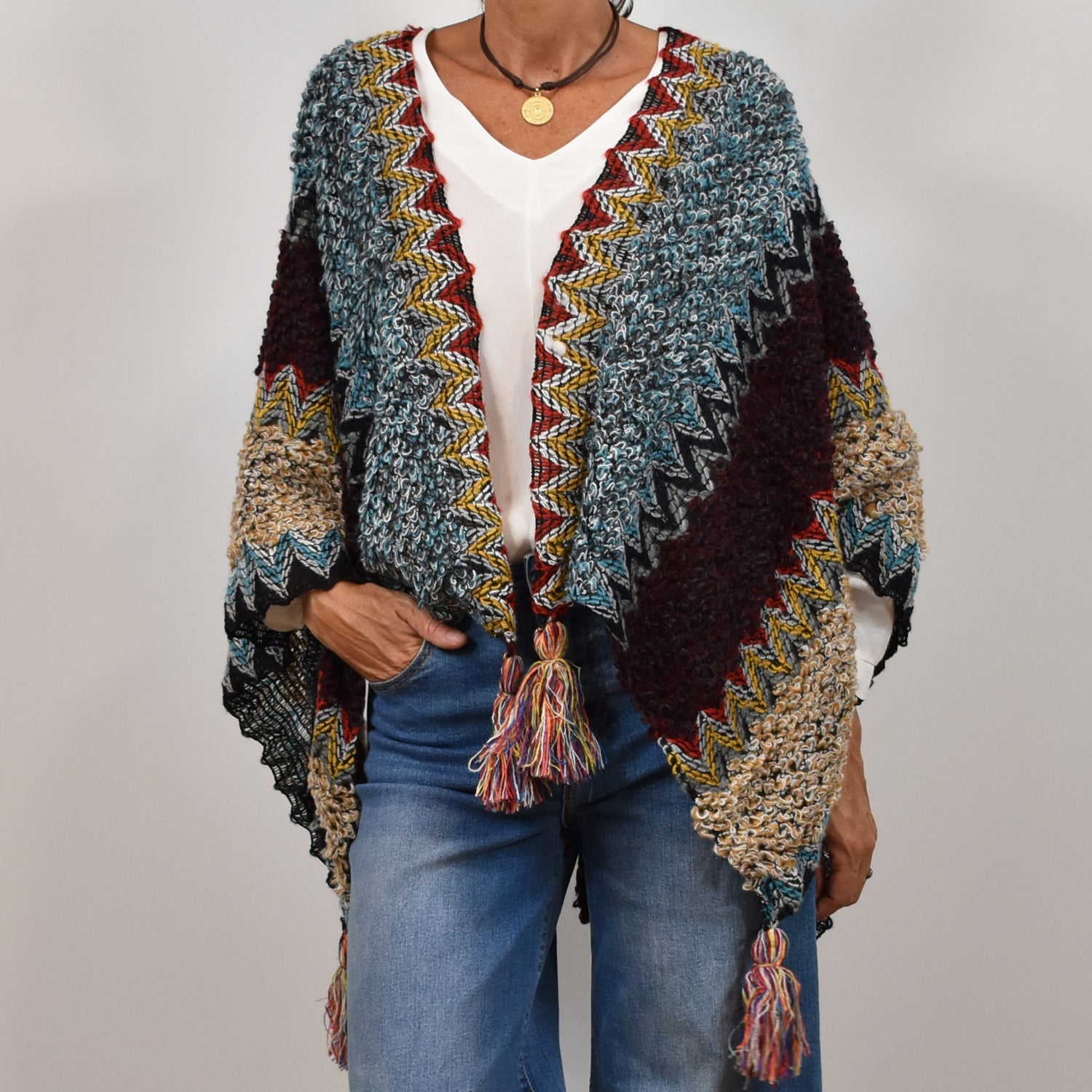 Poncho flecos azul