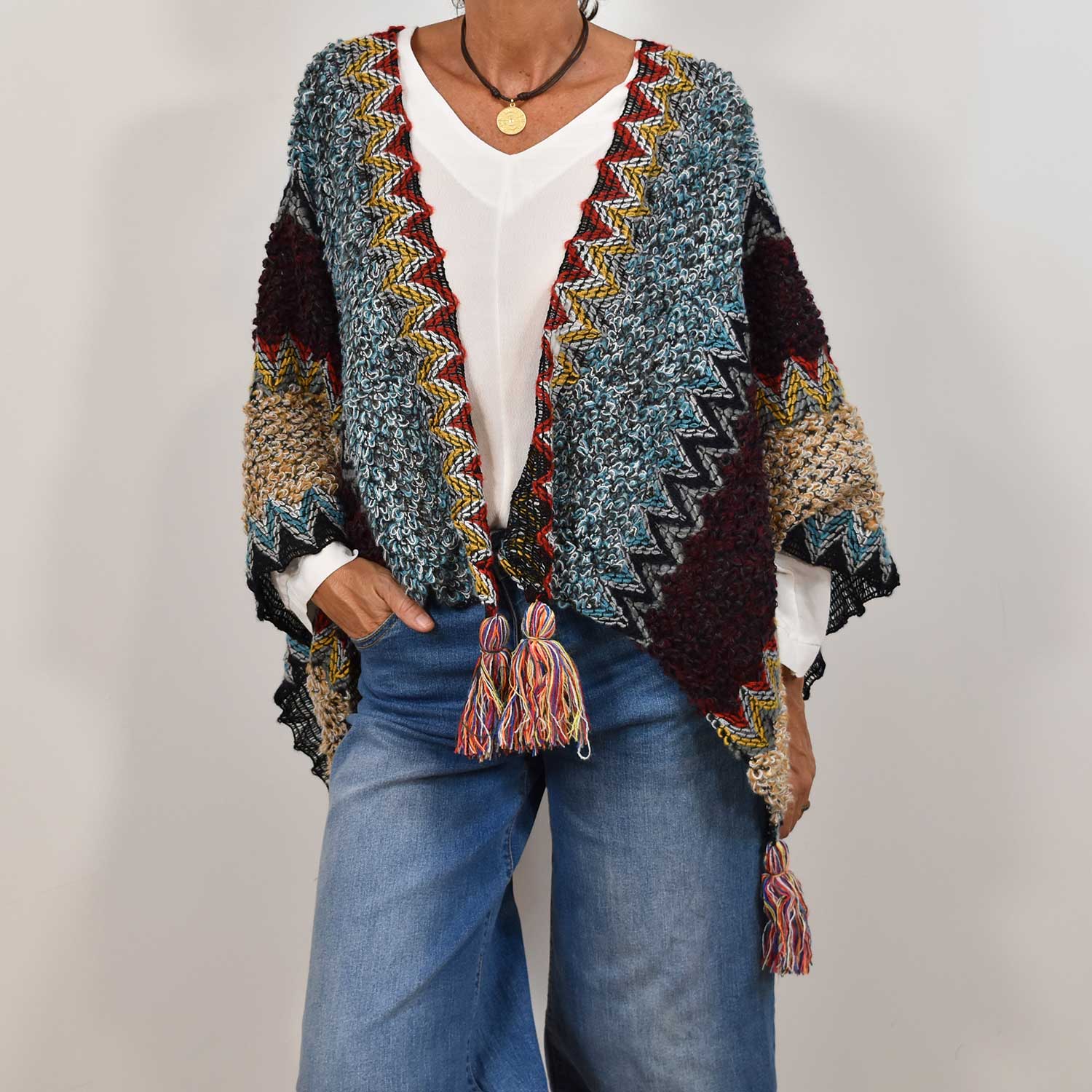 Poncho flecos azul