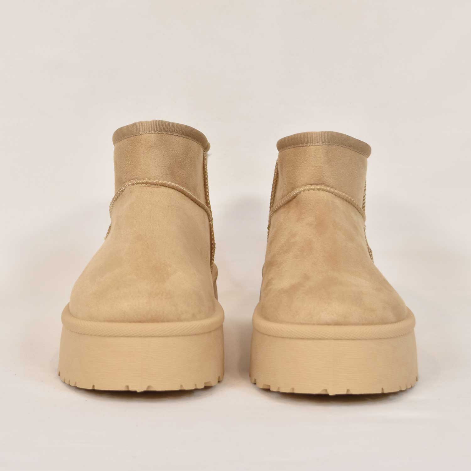 Mini-bottes fourrées beige