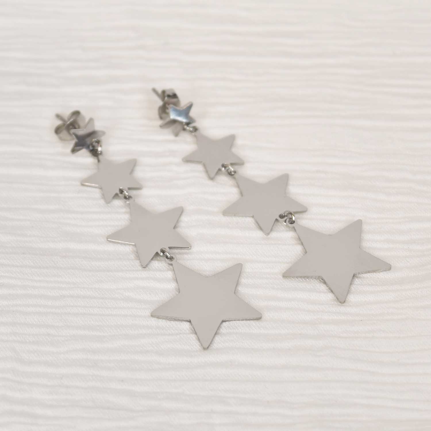 Pendientes estrellas plateado