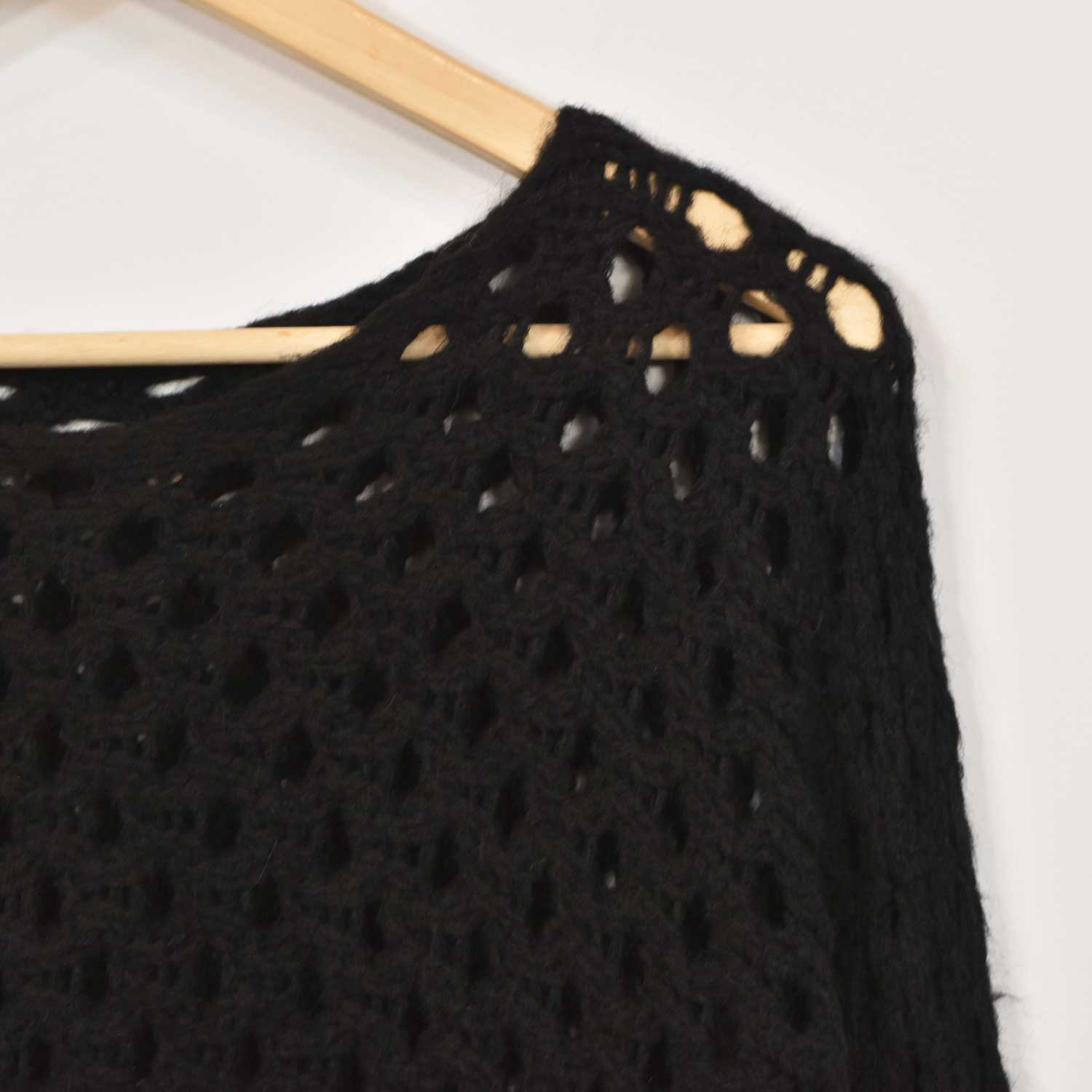 Black openwork sweater