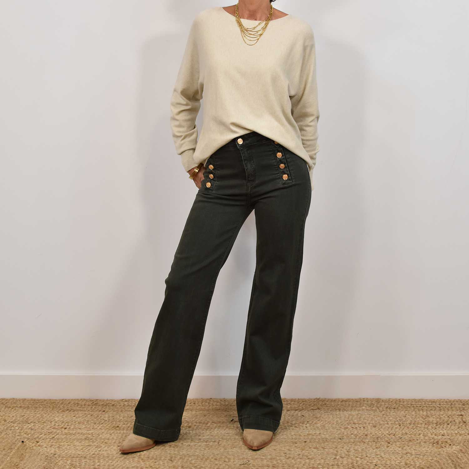 Khaki trousers with gold buttons