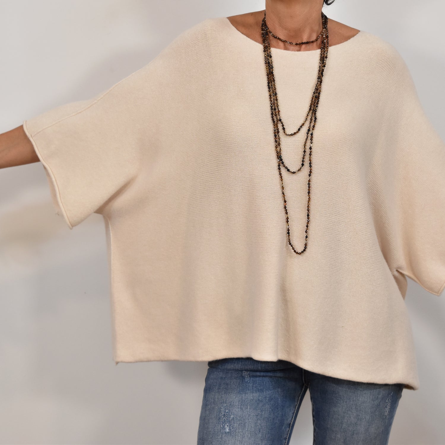 Beige sweater poncho