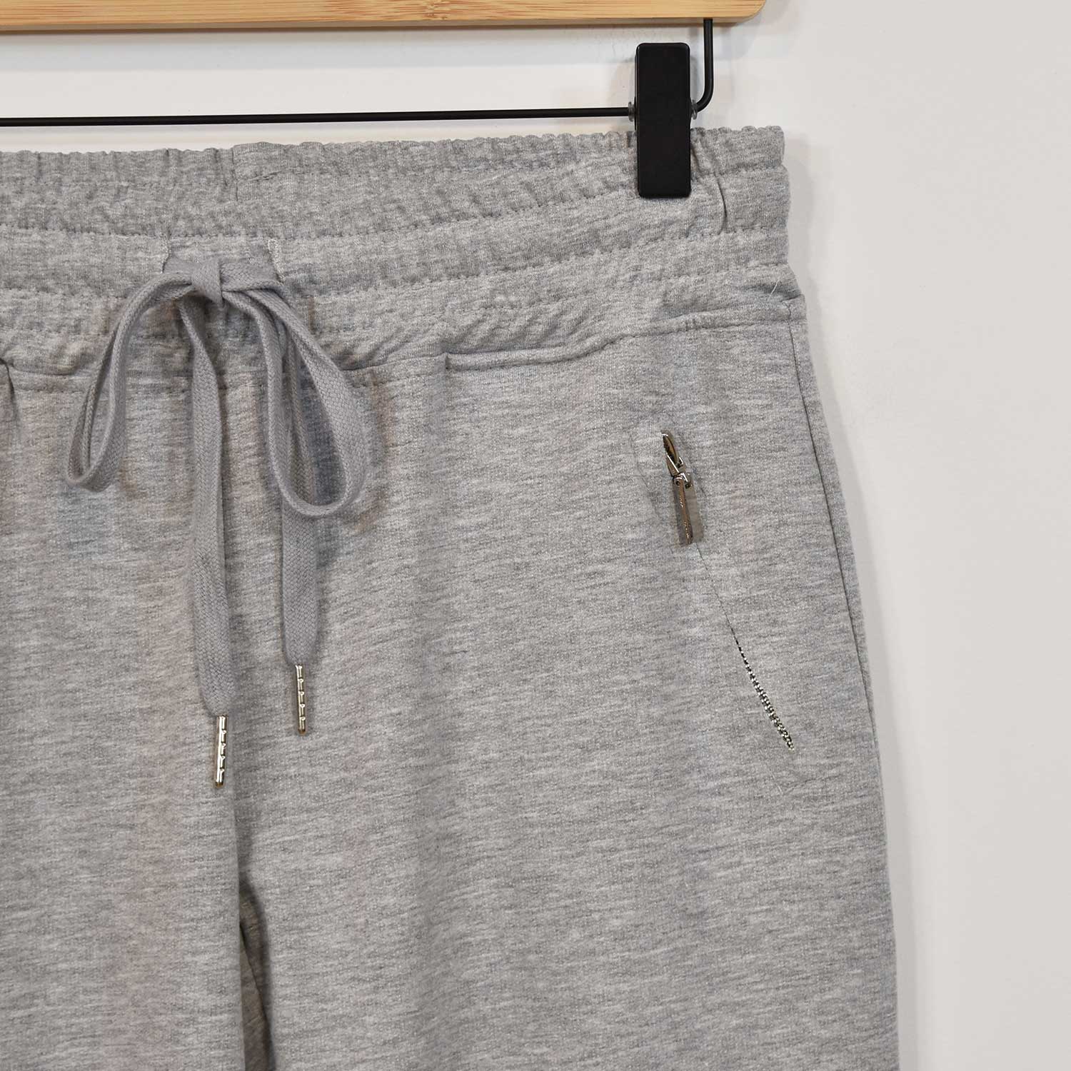 Pantalon jogger gris zippé