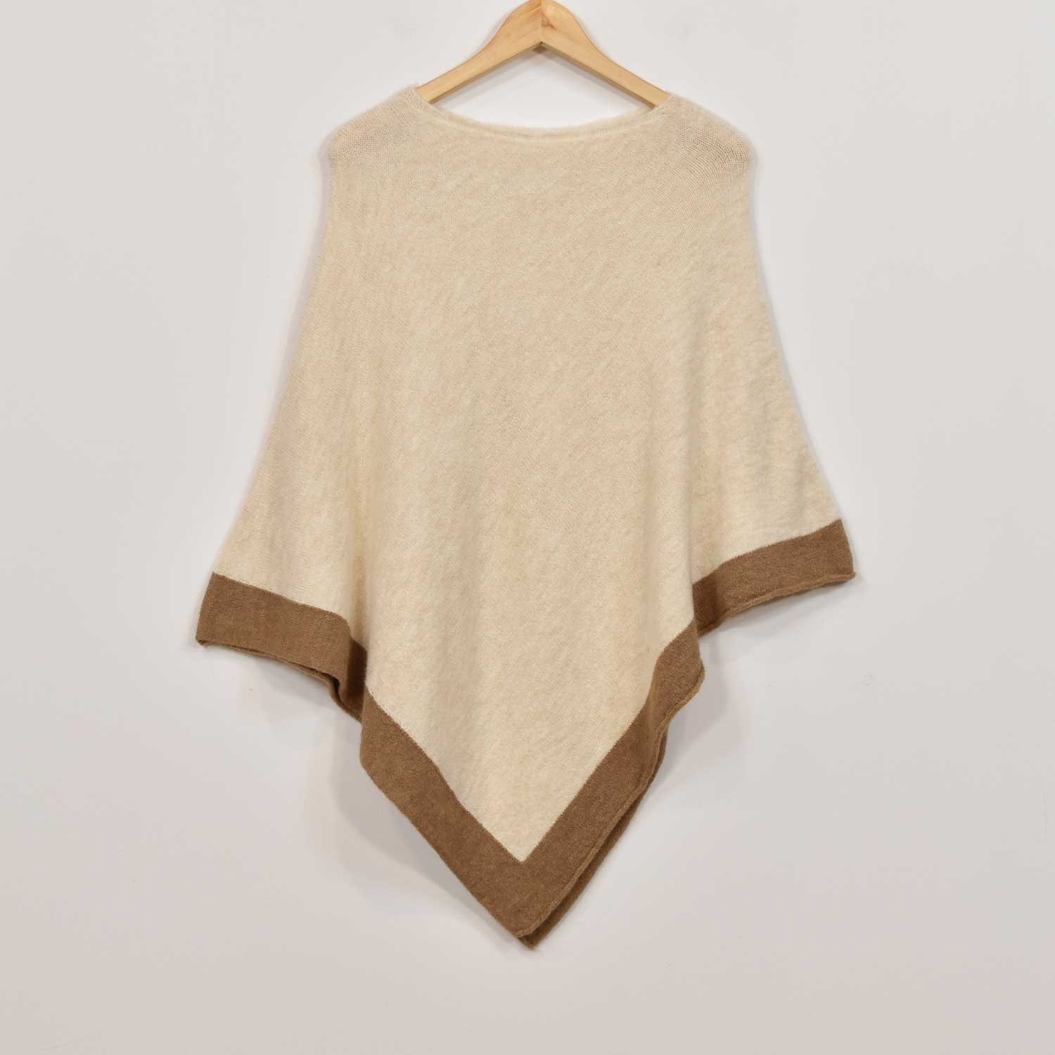 Poncho bordure beige