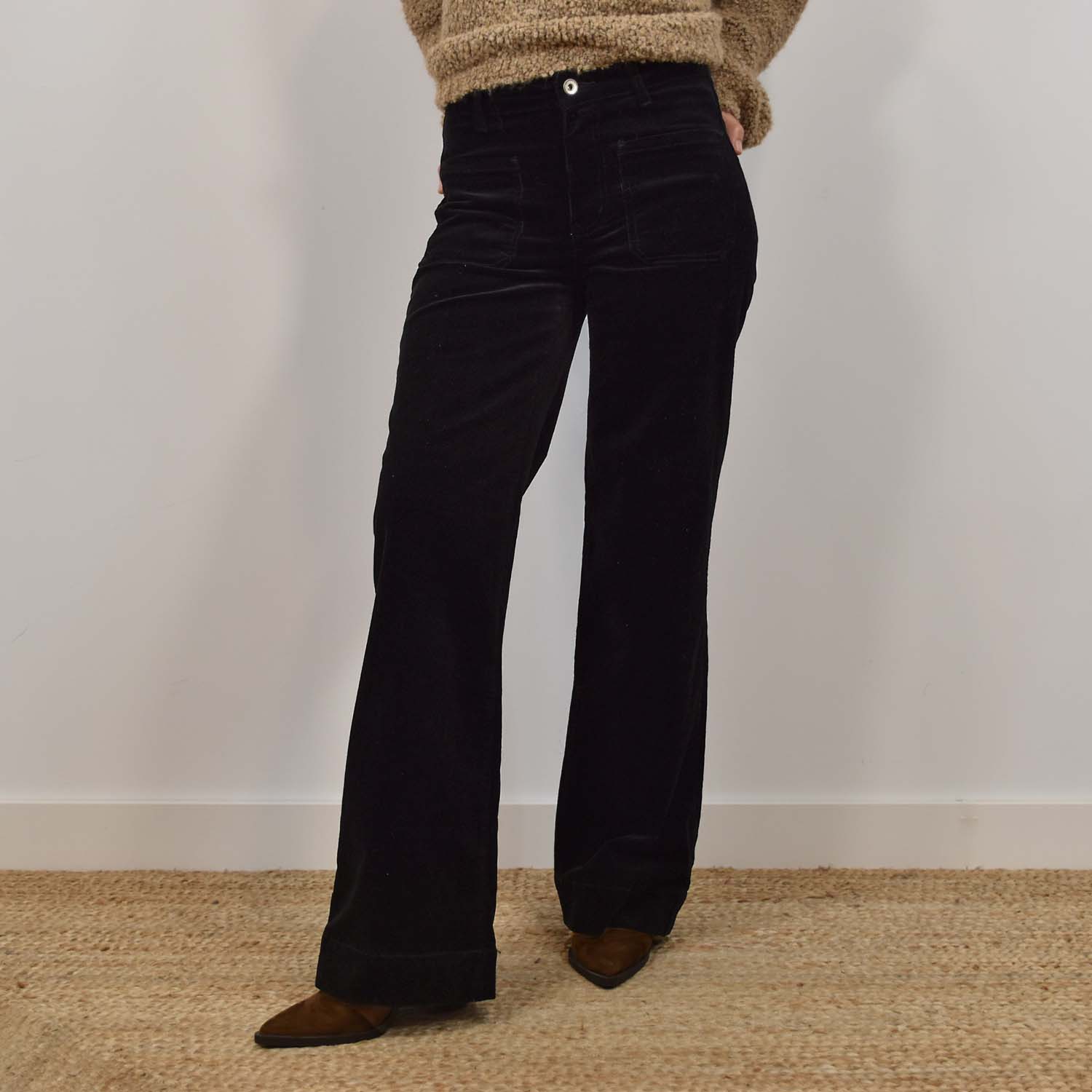 Black corduroy trousers