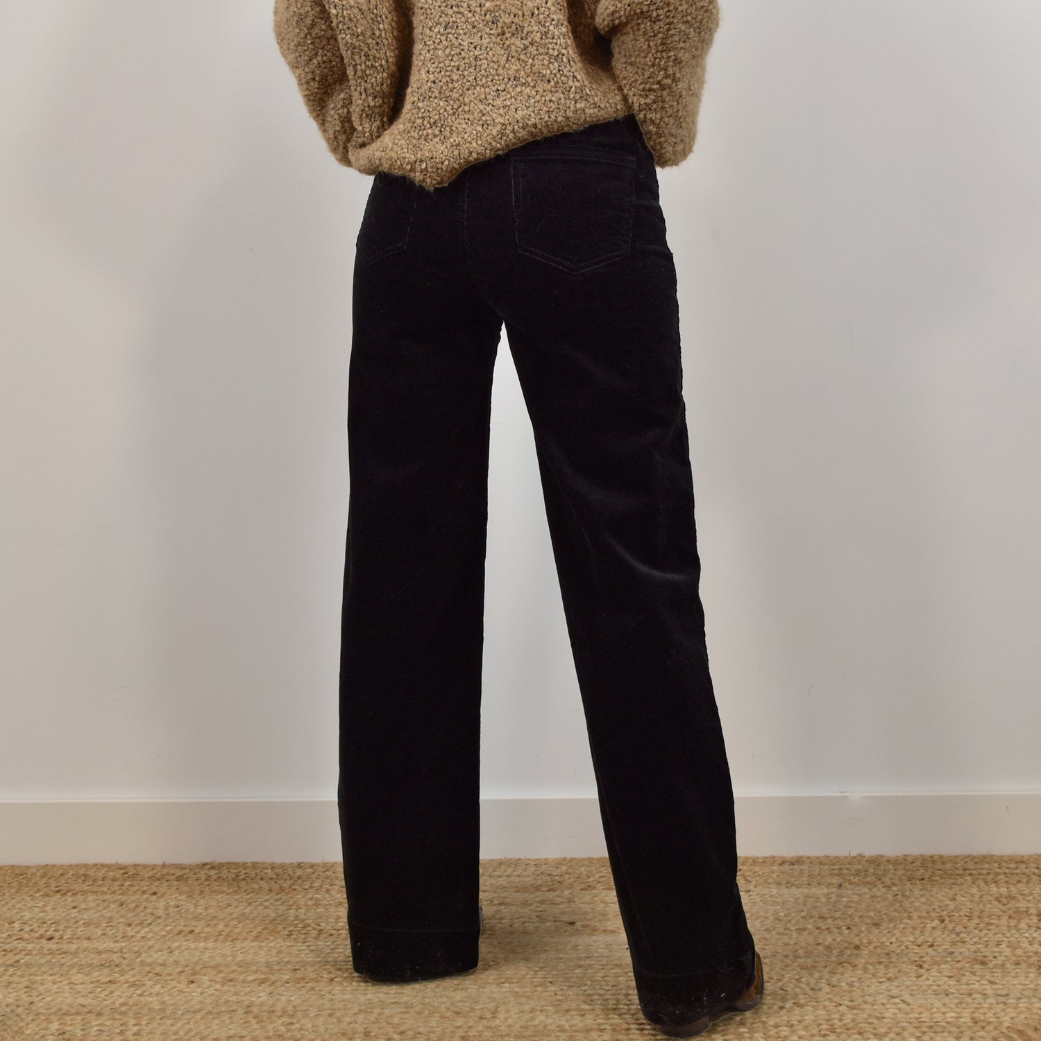 Black corduroy trousers