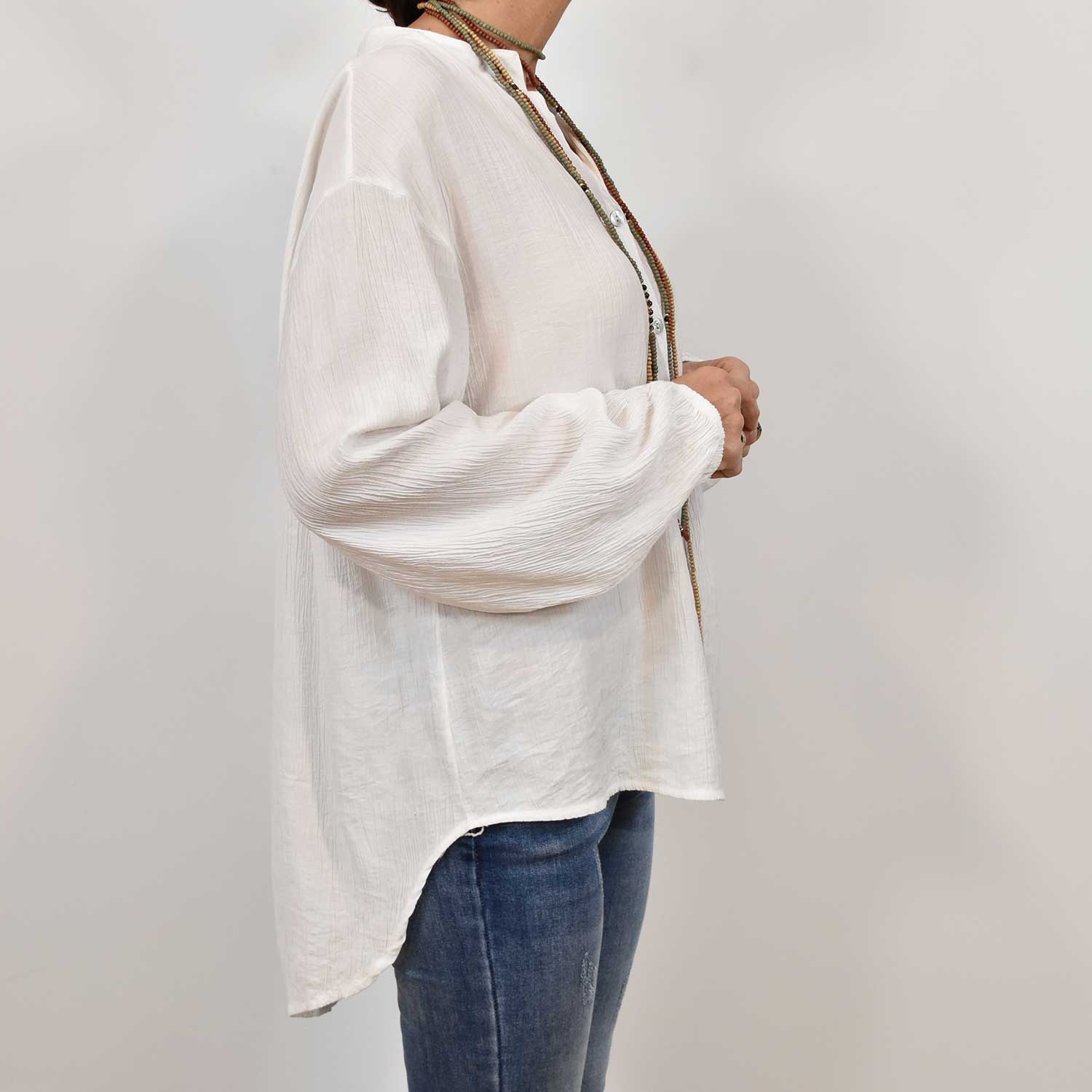White ruffled blouse