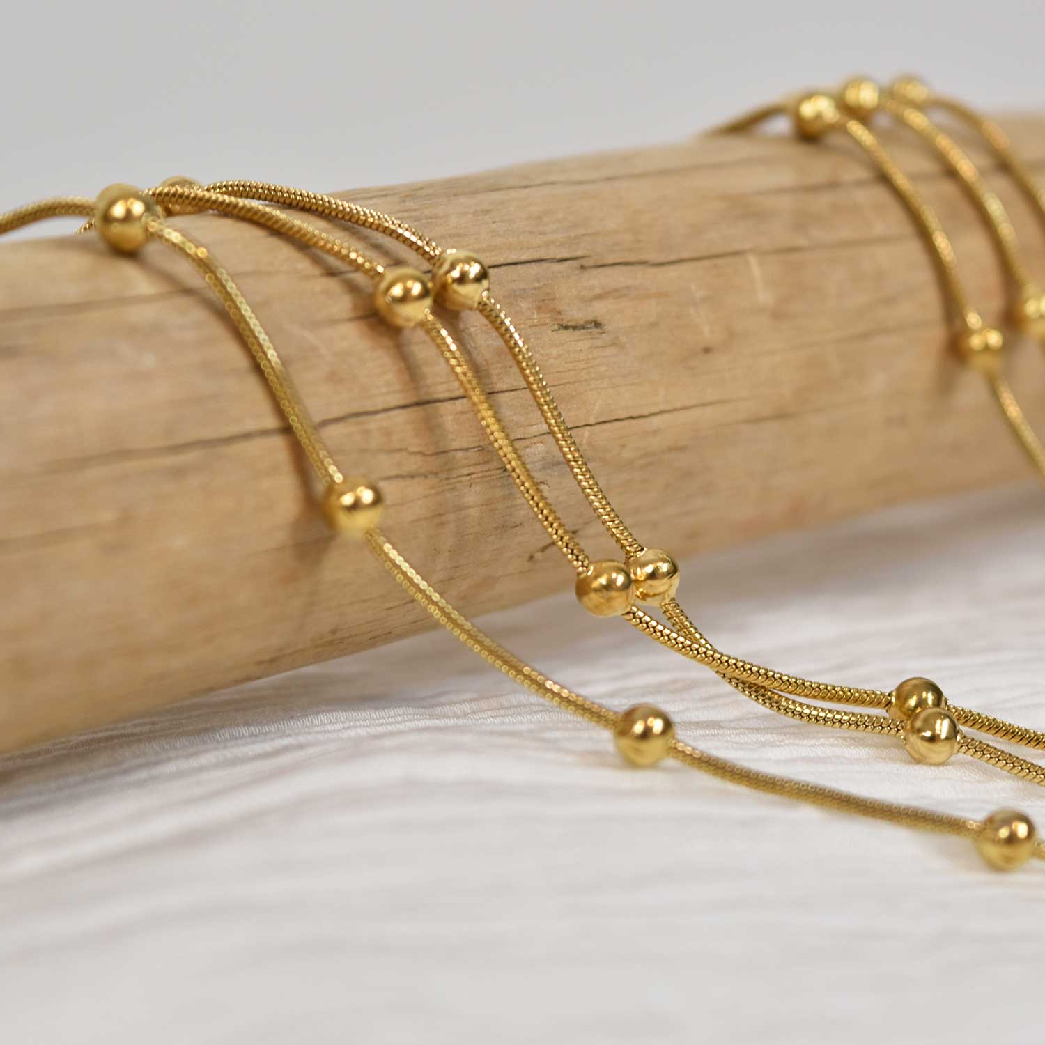 Tie gold beads necklace