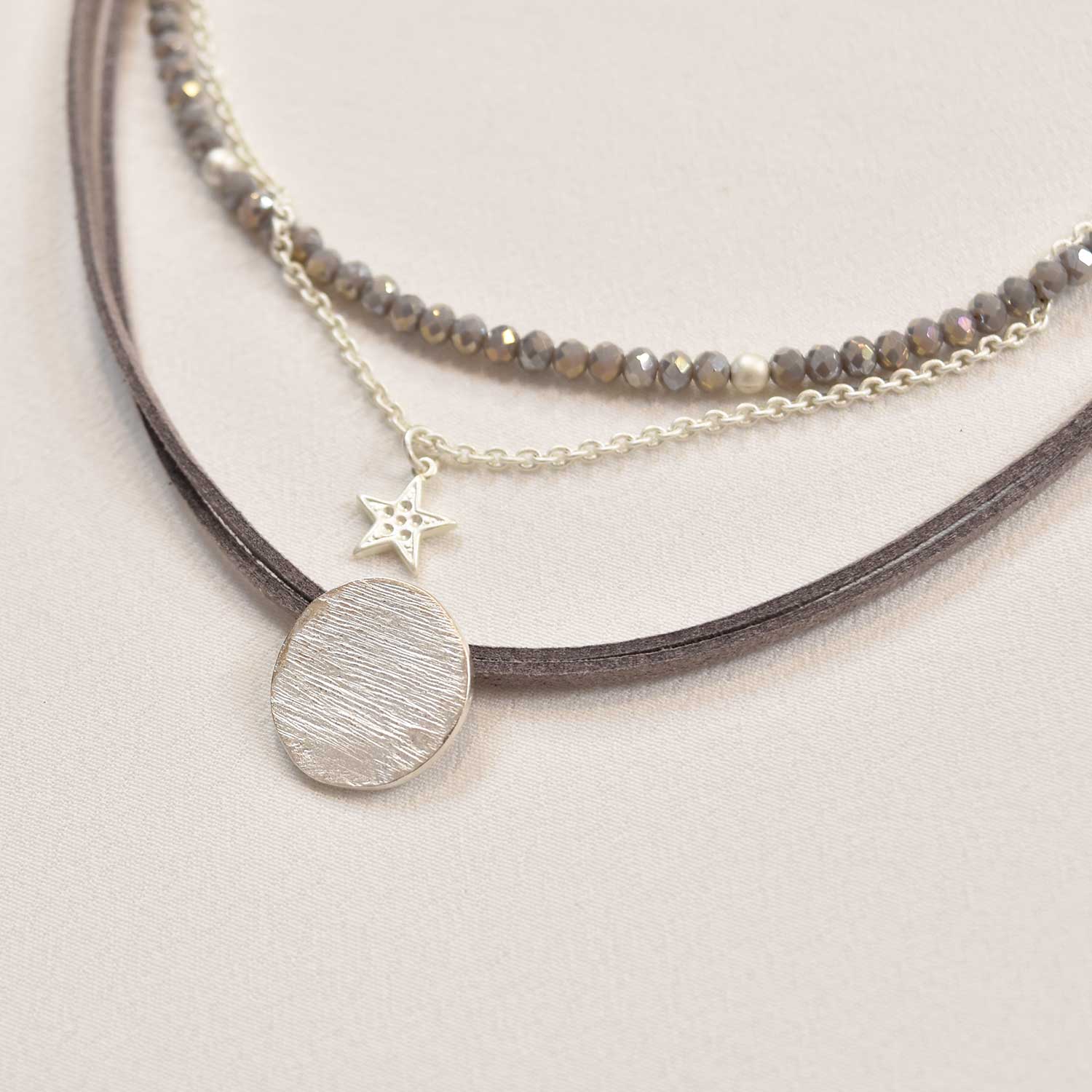 Silver gray triple medal necklace
