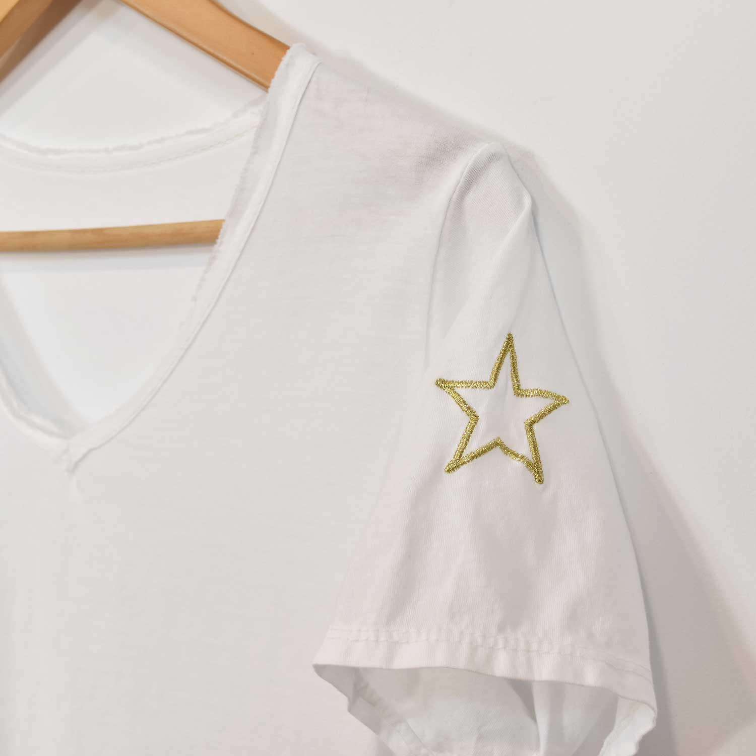 White gold star sleeve t-shirt