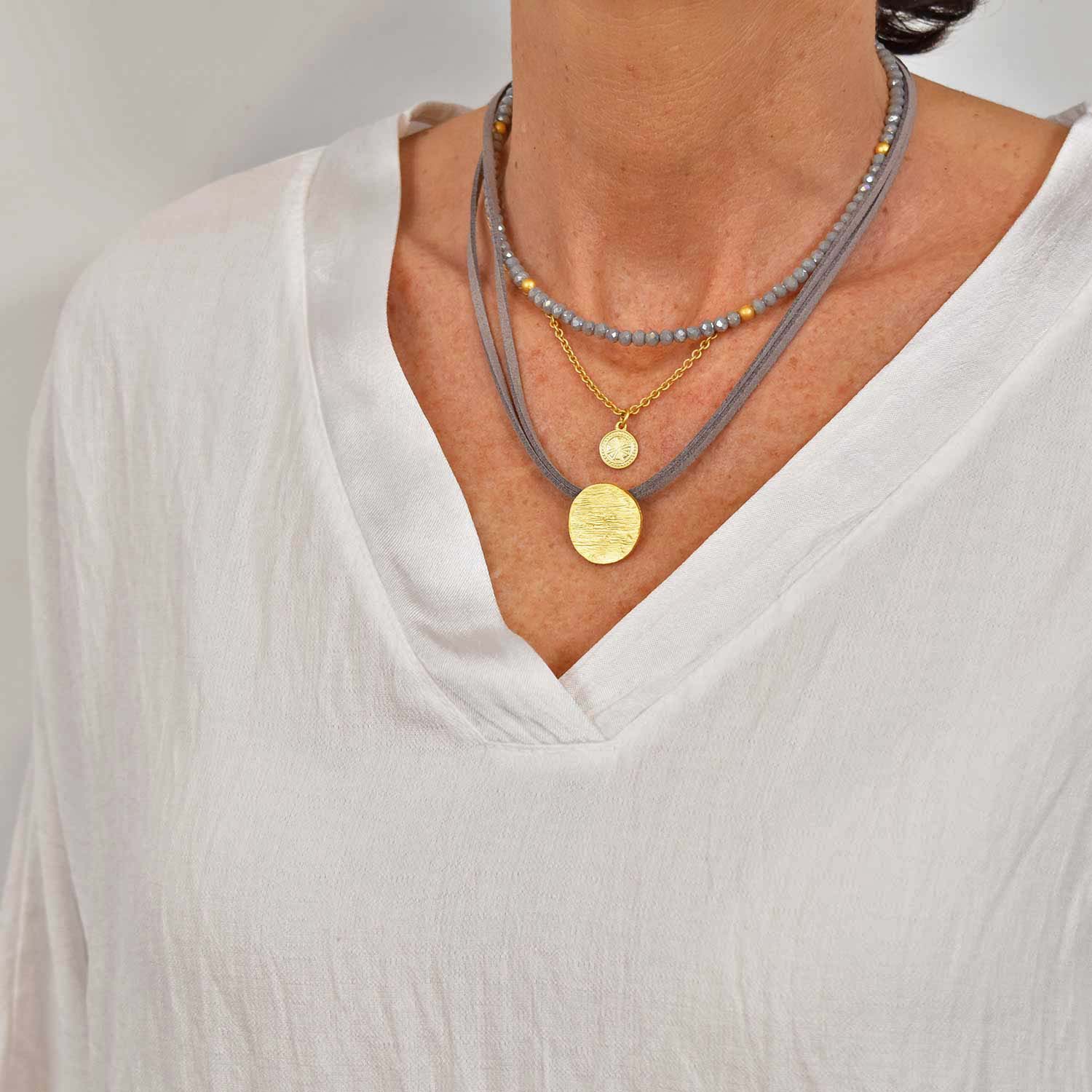 Gold gray triple medal necklace