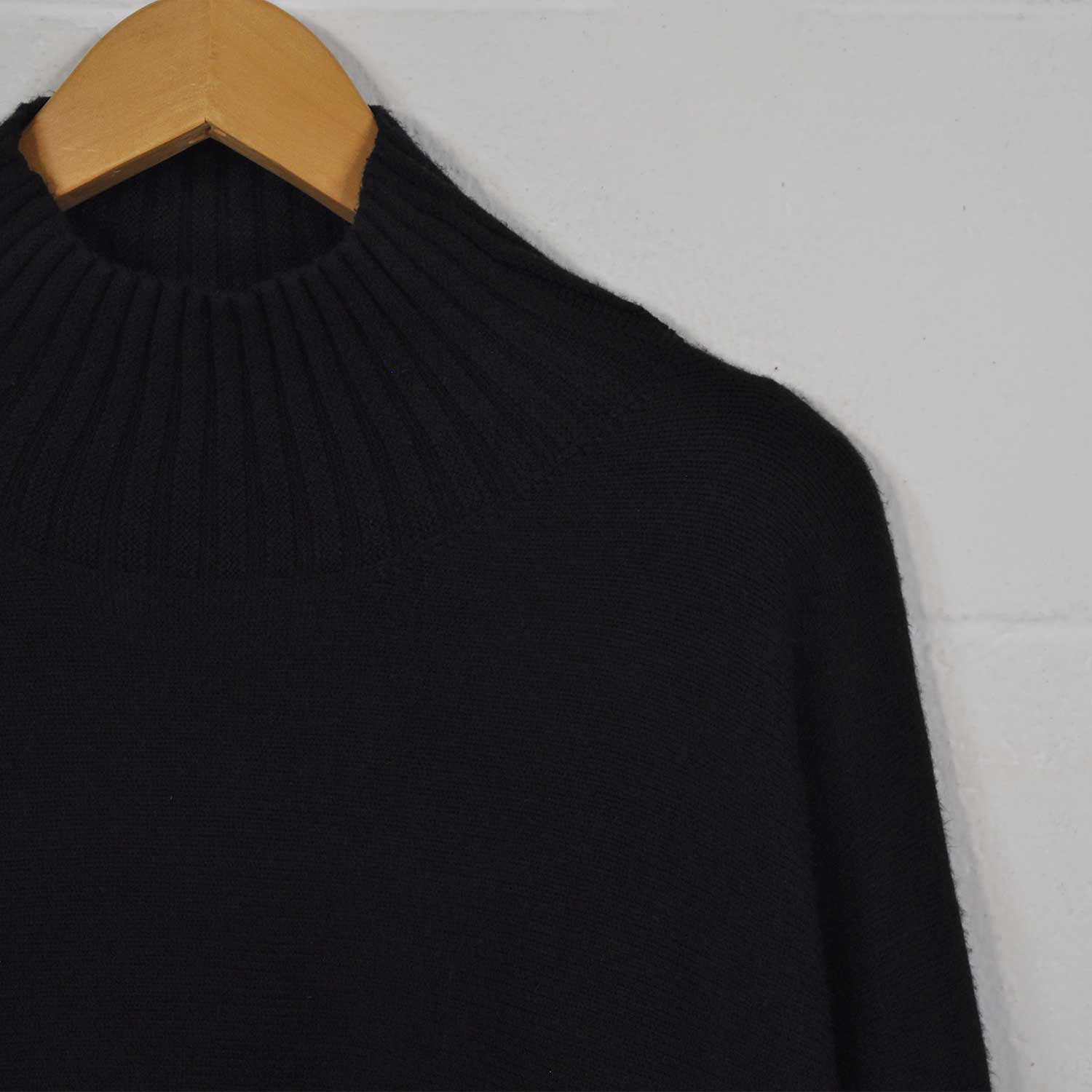 Black chimney neck sweater