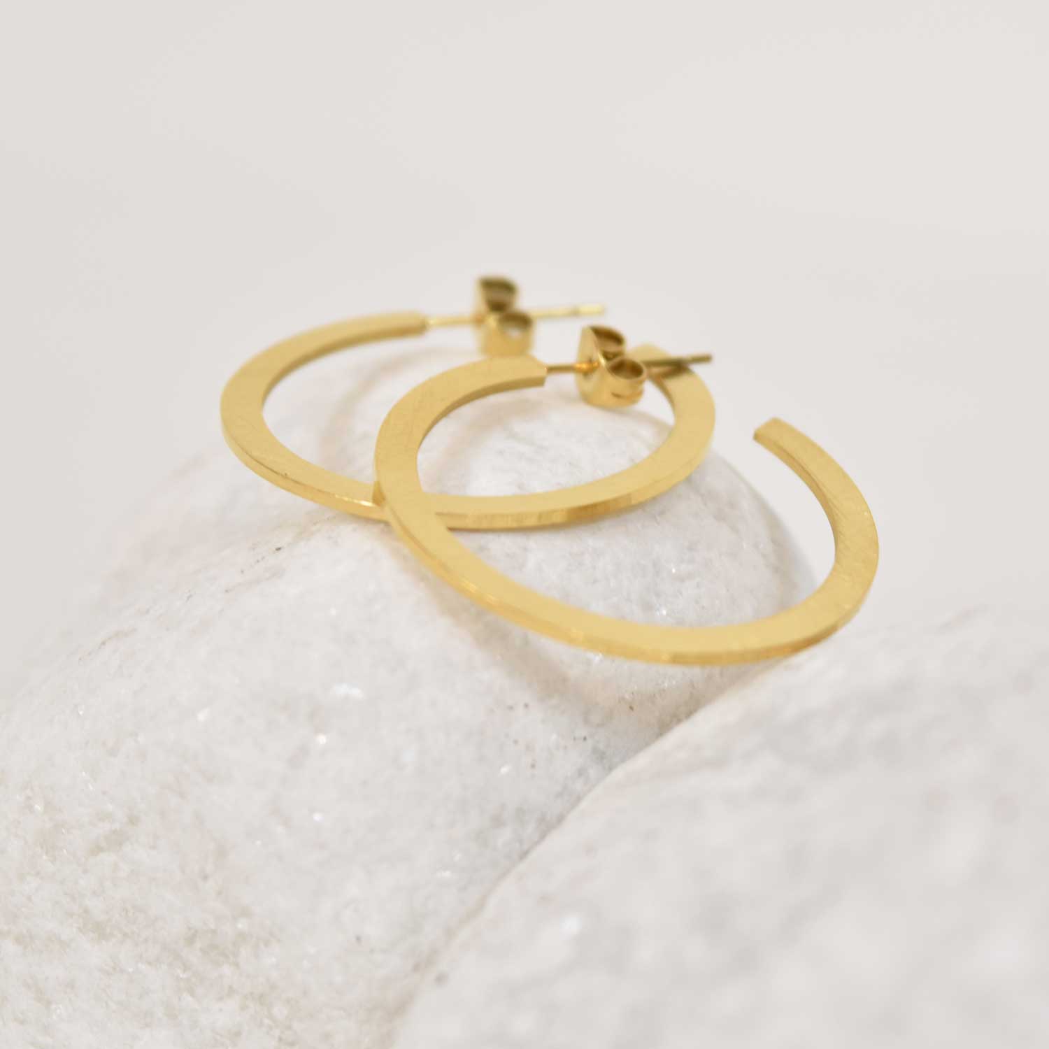 Golden flat hoop earrings