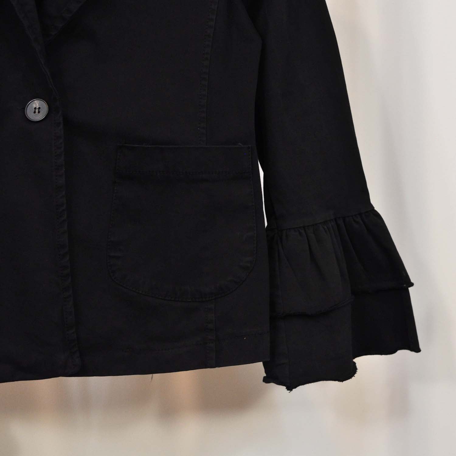 Black ruffled blazer