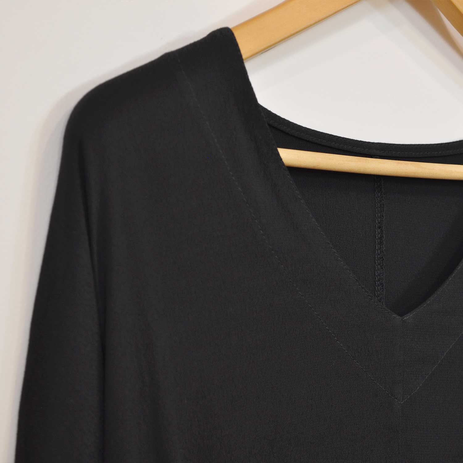 Black V-neck sewing blouse