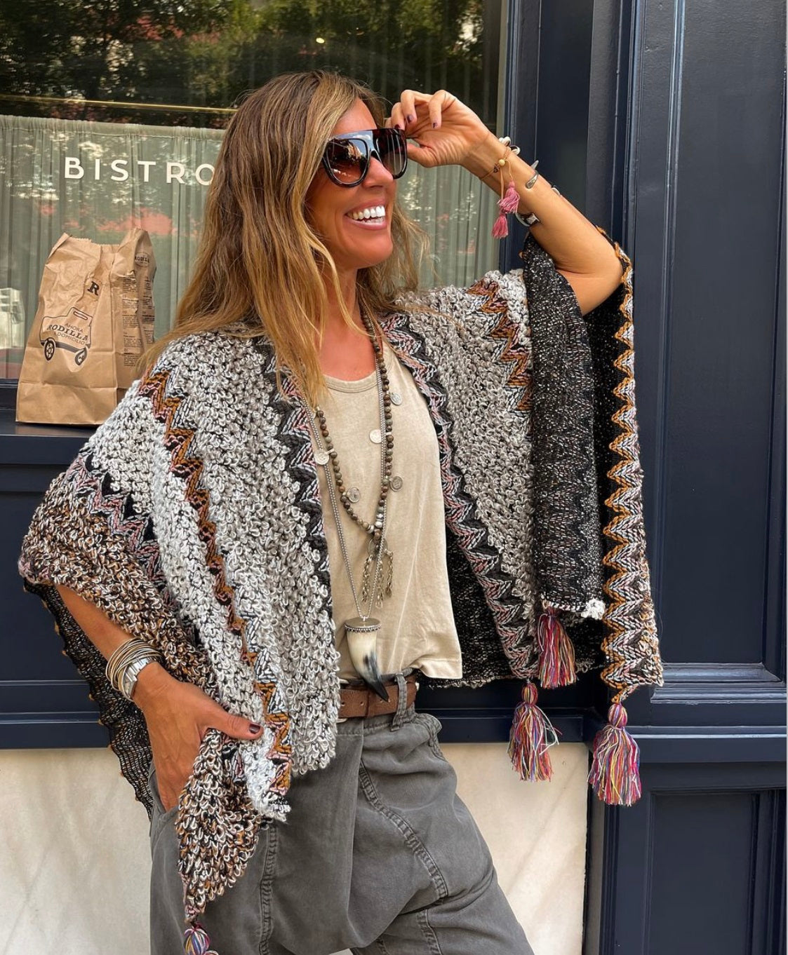 Grey fringed poncho