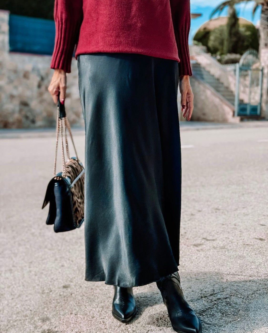 Black satin midi skirt