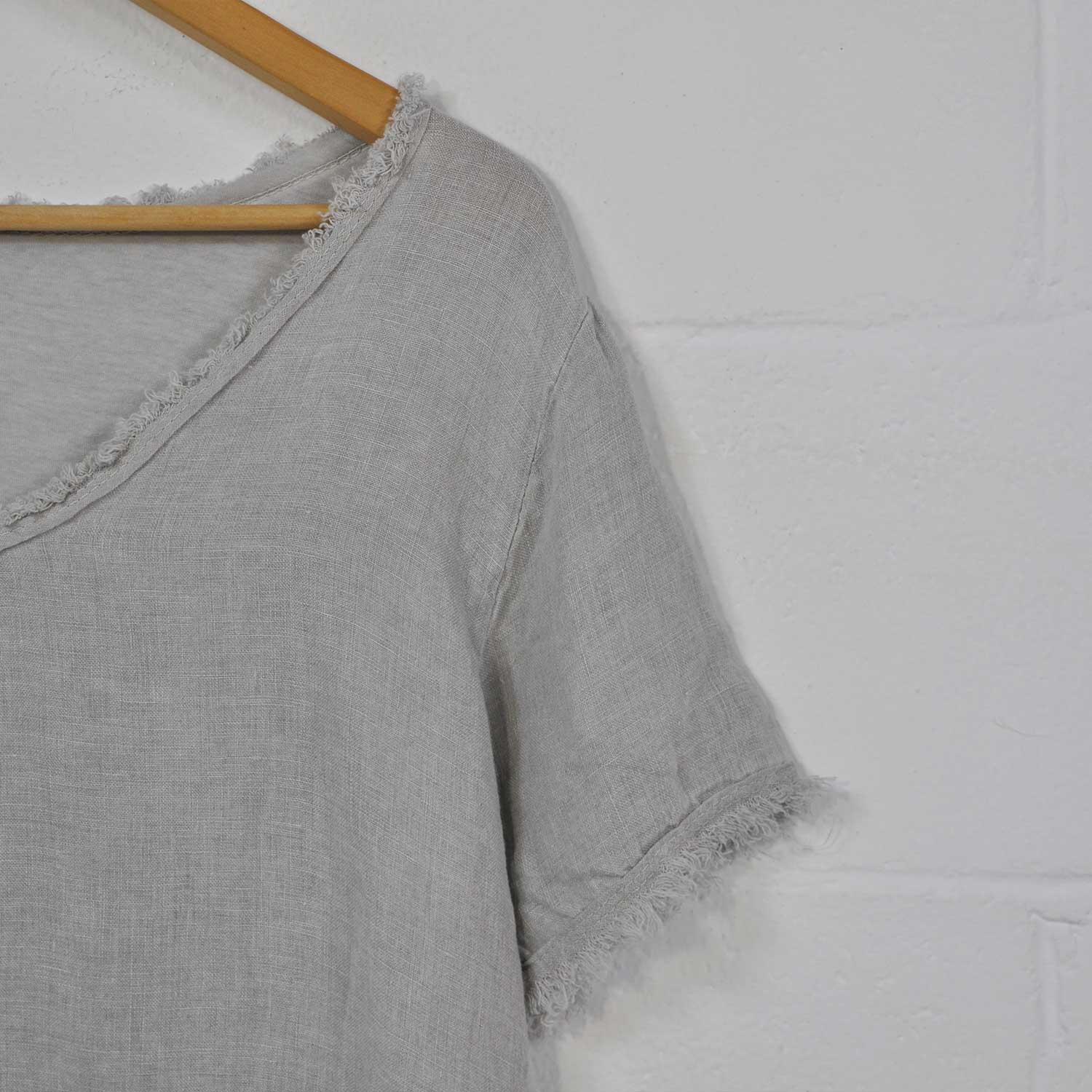 Blusa lino desflecada gris