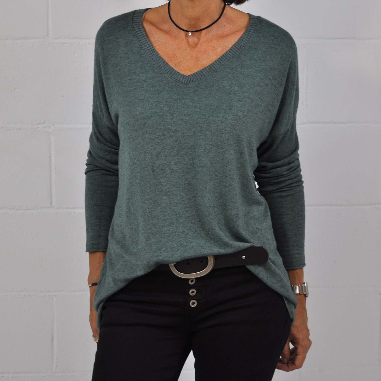 Green ribbed knit sweater